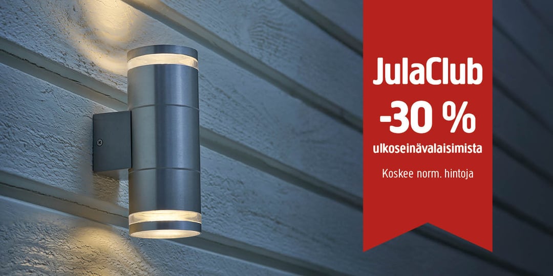 Puupaneeliseinään kiinnitetty sylinterimäinen ulkoseinävalaisin sijaitsee punaisen banderollin vieressä, jossa lukee: ”JulaClub –30 % ulkoseinävalaisimista. Koskee normaalihintoja.”.