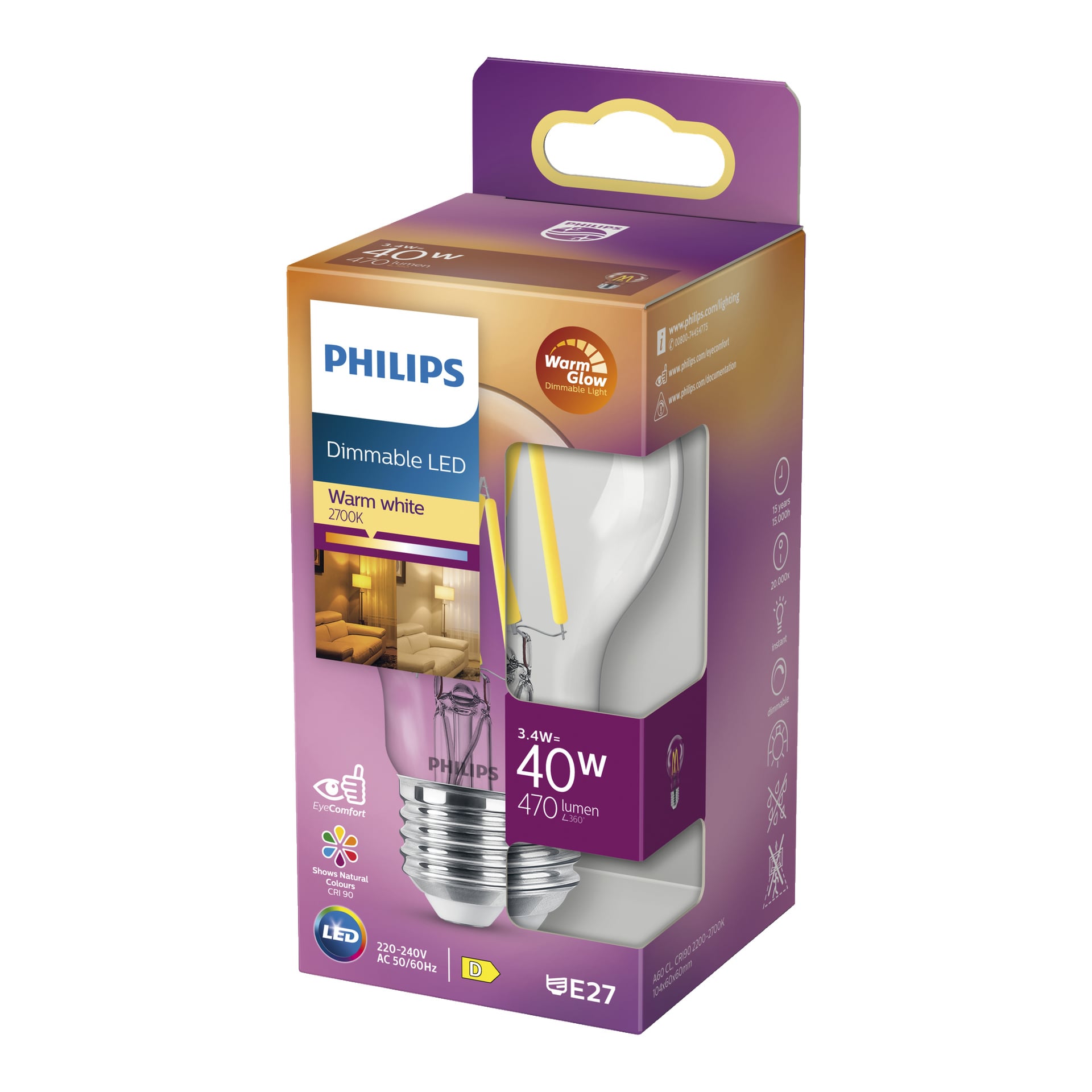 En Philips Dimmable LED WarmGlow-lampa i varmt vitt (2700K) visas i sin lila och gula ruta, märkt med 3,4W = 40W, 470 lumen och E27-bas. Förpackningen visar ikoner och en bild av ett varmt upplyst rum.