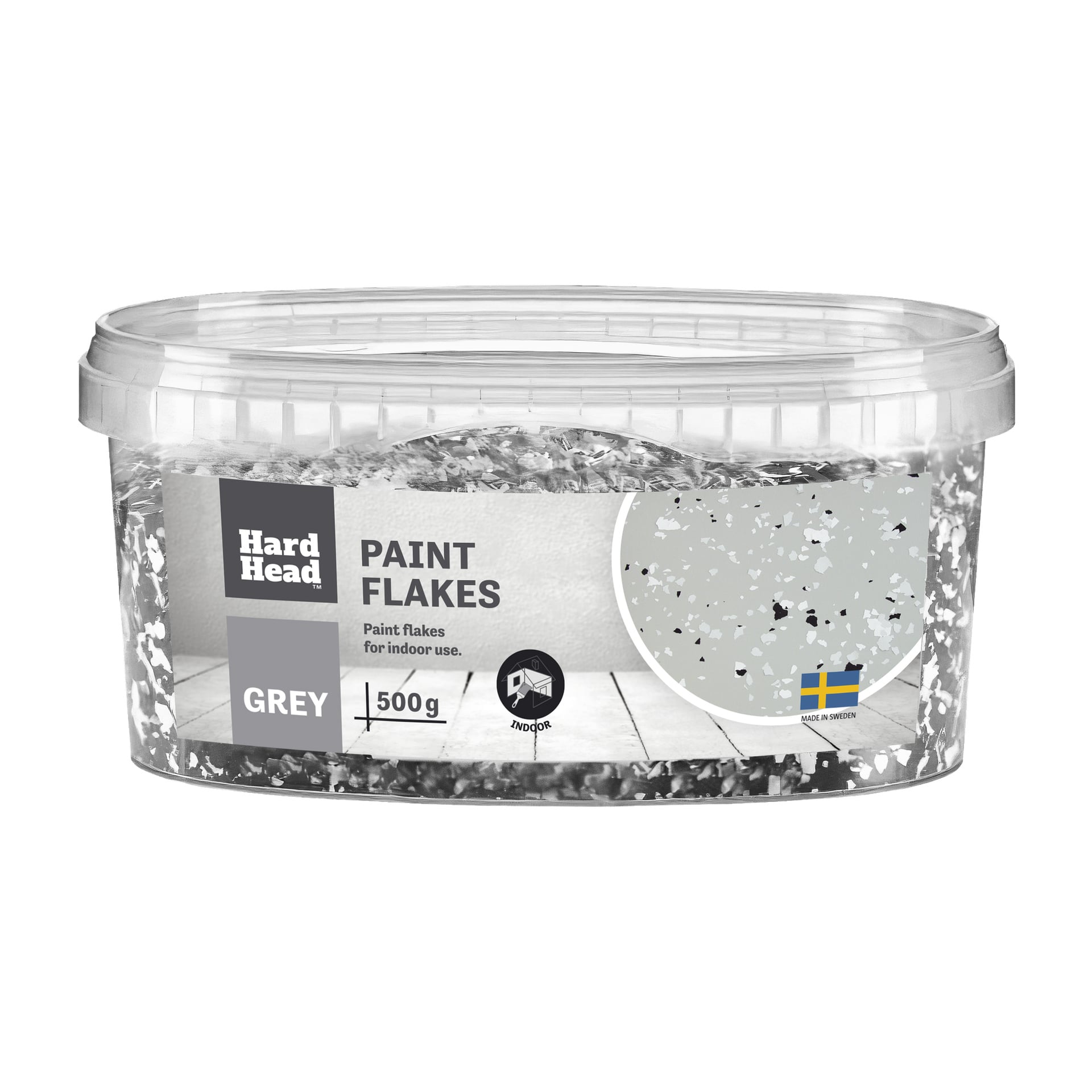 Przezroczysta plastikowa pojemnik oznaczona jako Paint flakes by Hard Head, szara, 500g, przeznaczona do użytku wewnętrznego. Opakowanie pokazuje wygląd płatków oraz szwedzką flagę z napisem Made in Sweden.