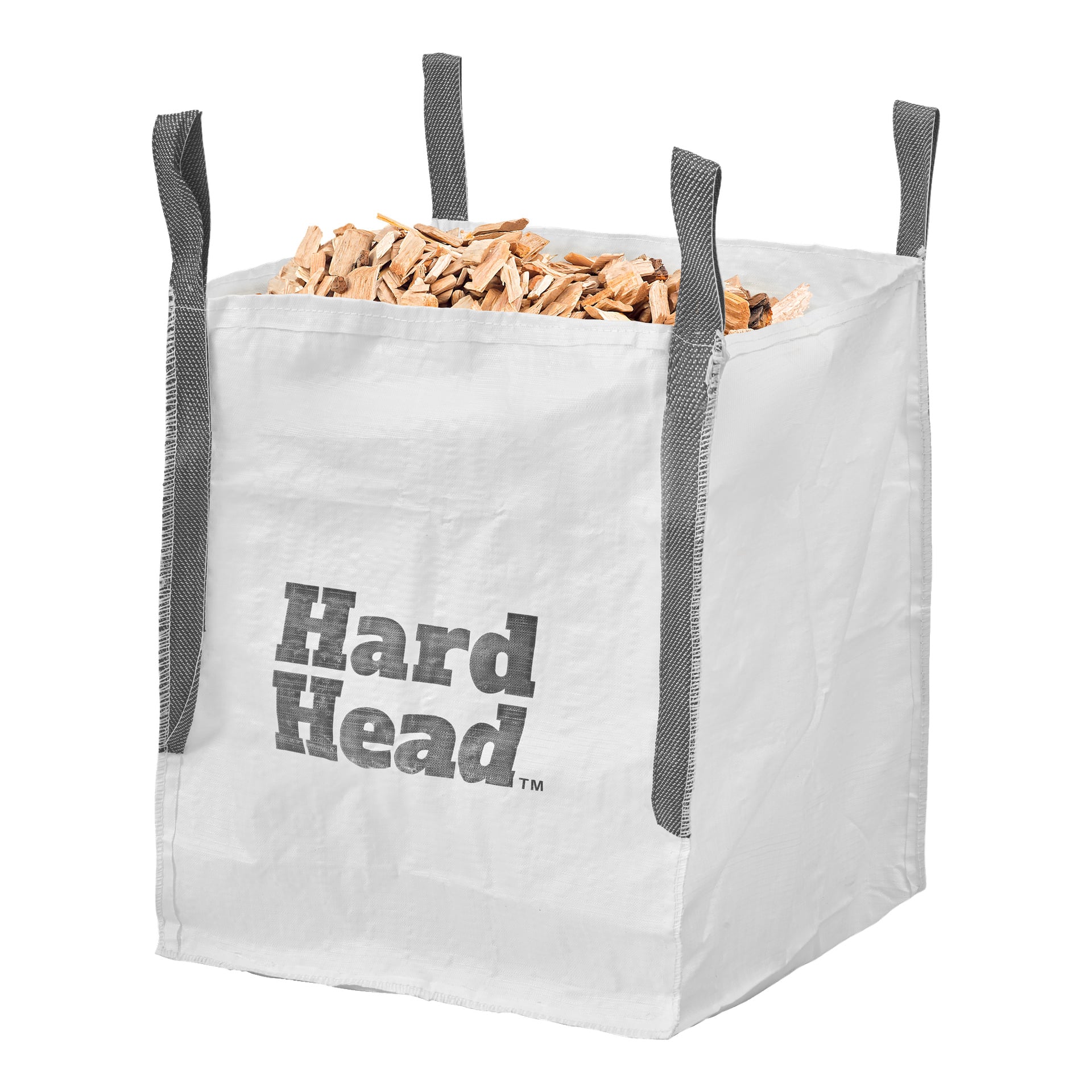 En vit tygväska från Hard Head Builders med grått handtag i varje hörn står upprätt, fylld med hackade träbitar.