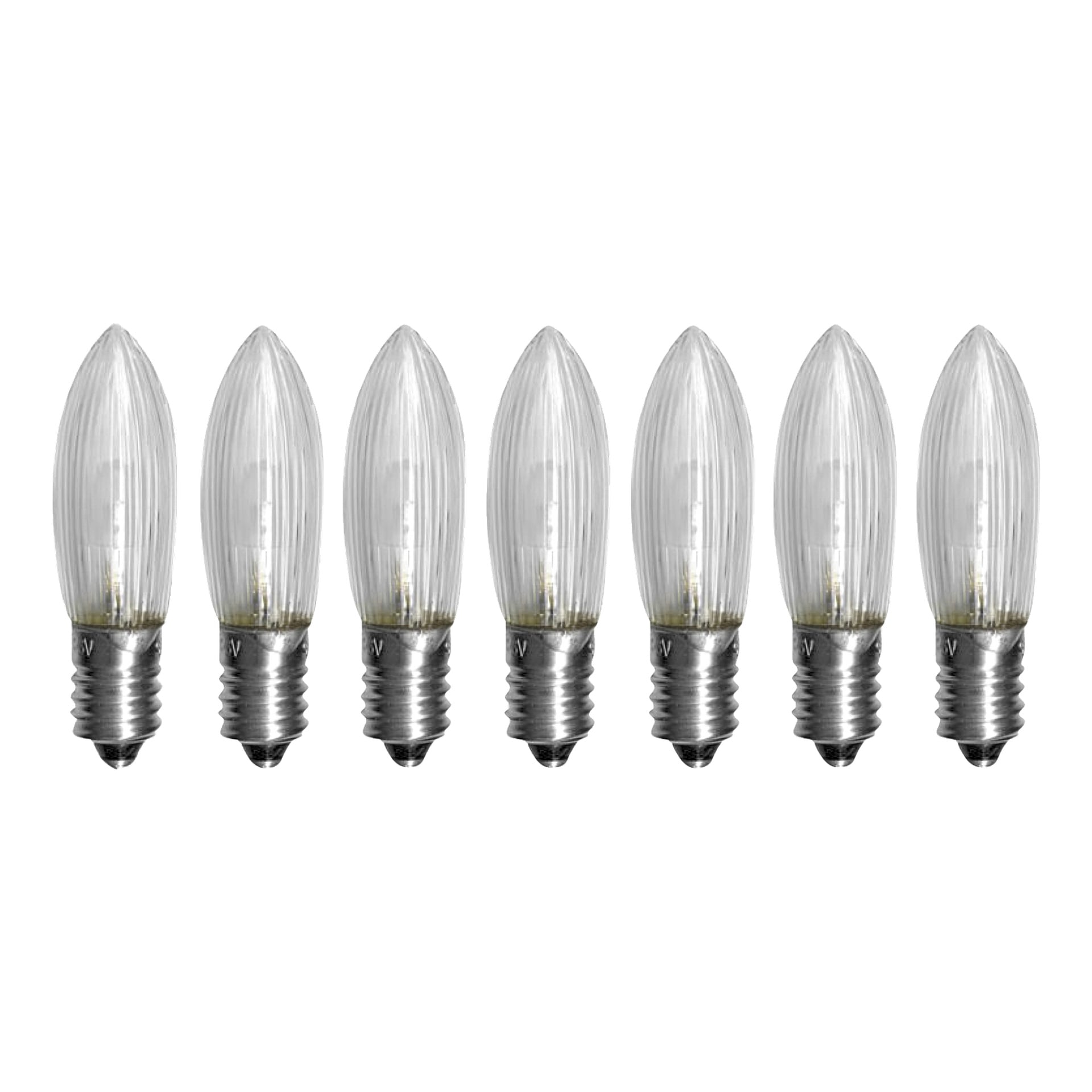 Sju klara, ljusformade EKVIP reservlampor för en Advent-ljusstake (LED, 7-pack) med metallskruvar är uppradade i en horisontell rad.