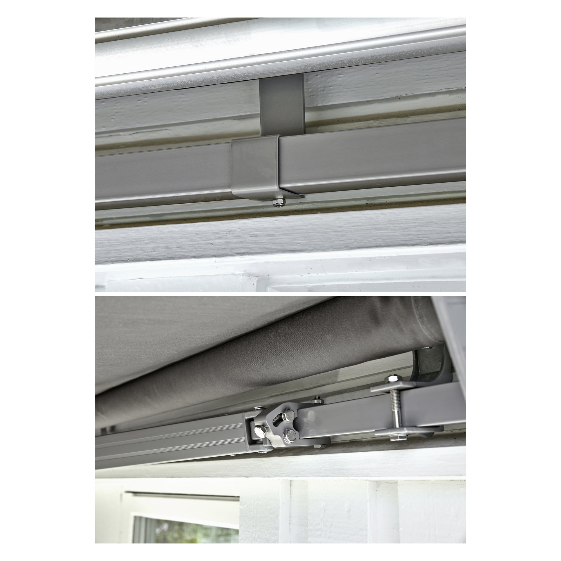 Närbilder visar det grå metallstödet och monteringsfästet på Hard Head Patio markisen som installerats ovanför ett fönster på en yttervägg, med fokus på de mekaniska lederna och anslutningspunkterna.