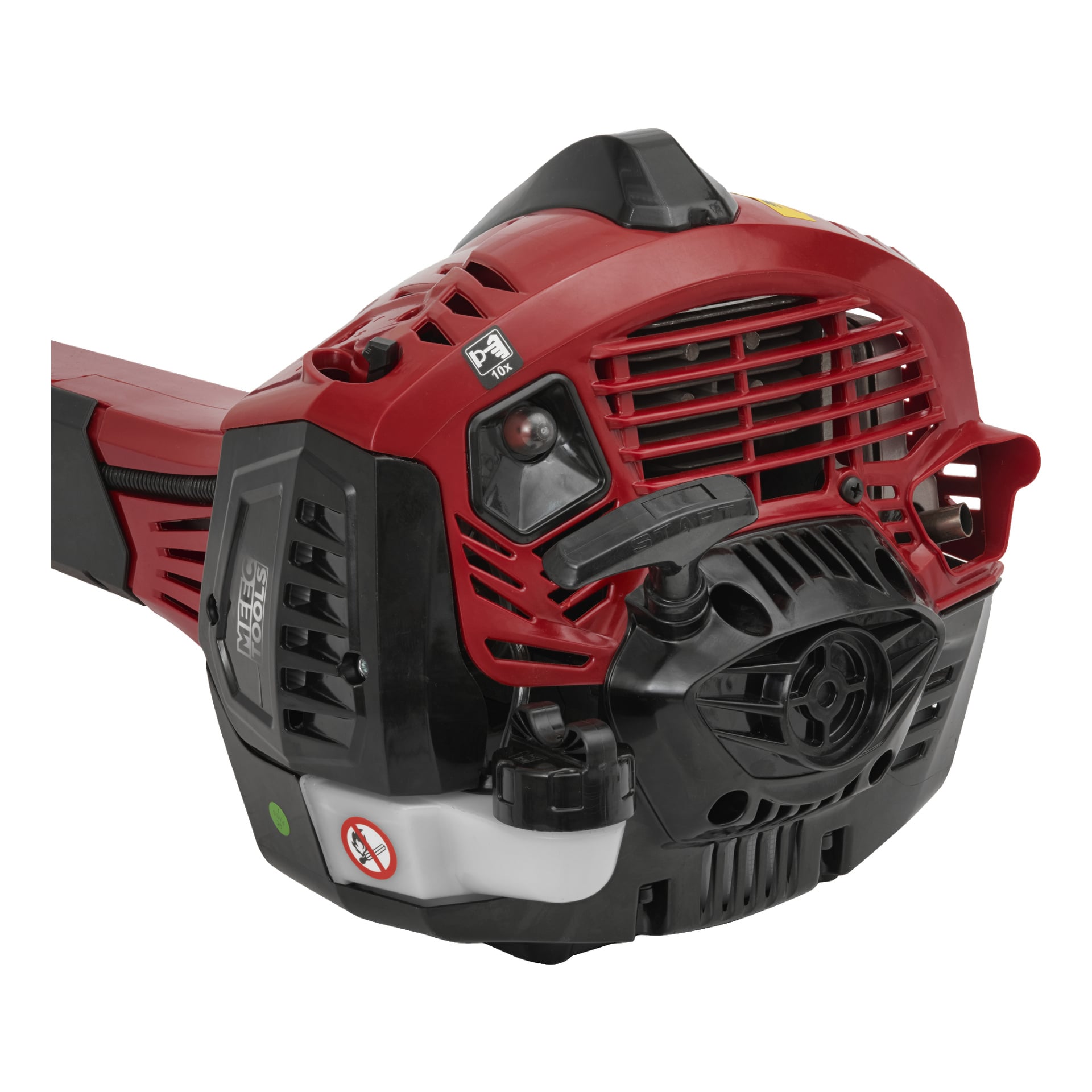Närbild på en röd och svart Meec Tools Brush Cutter-bensinmotor, som visar luftventilen, starthandtaget, varningsetiketten och flera synliga mekaniska delar.