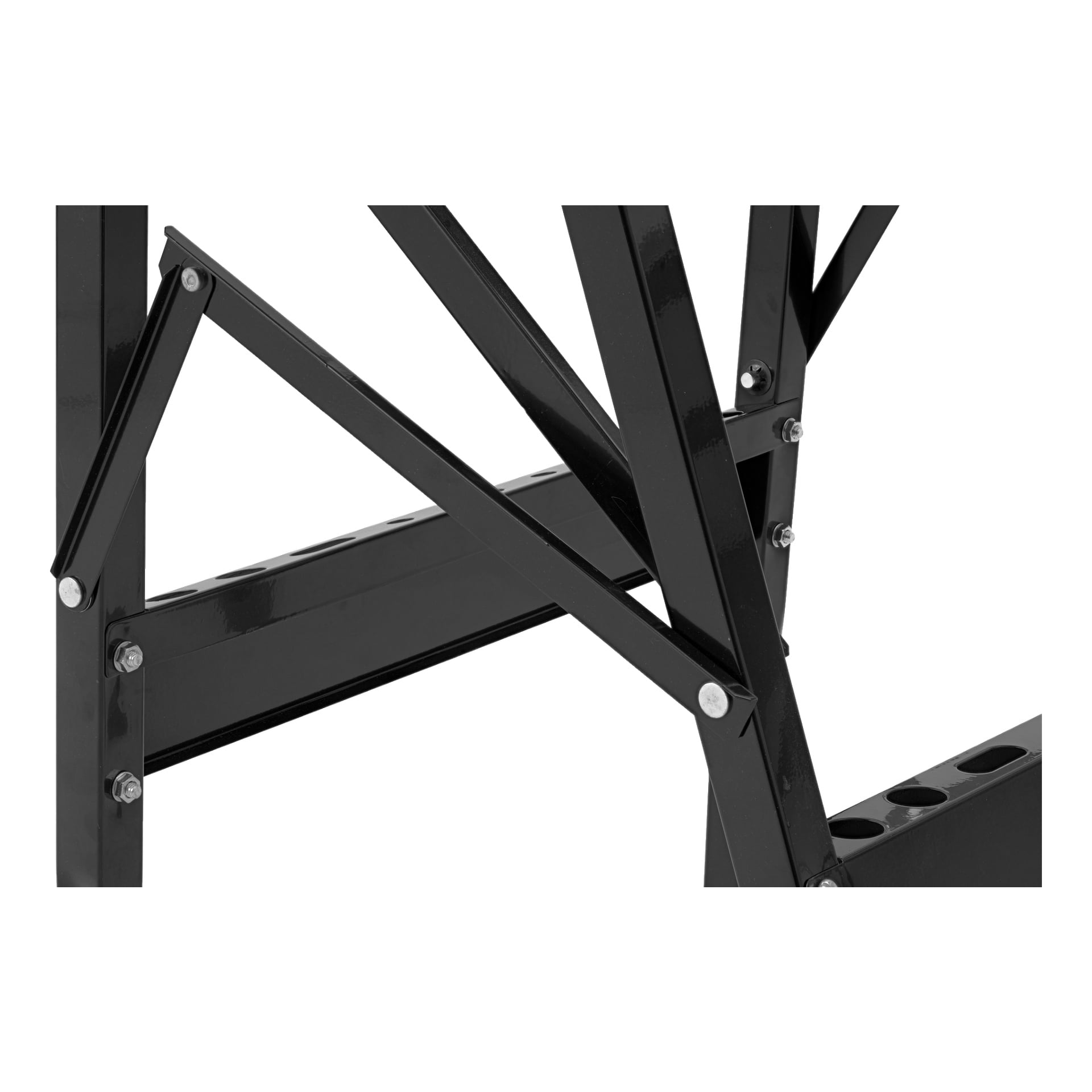 Detaljerad vy av Hard Head Foldable-arbetsbänkens svarta metallram, med markering av korsande bultar och stödstänger i olika vinklar. Designen inkluderar rektangulära balkar och diagonala stag med en blank yta.