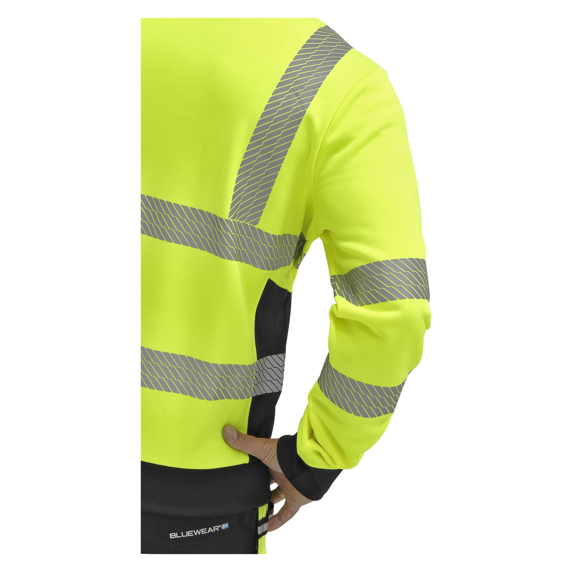Eine Person ist von hinten zu sehen, die einen gelben Bluewear Hi-Vis-Pullover mit reflektierenden grauen Streifen trägt. Zu den sichtbaren Teilen gehören ihr Rücken, ein teilweiser Arm und eine Hand, die auf der Hüfte ruht. "Bluewear" ist in der Nähe des Hosenbunds angebracht.