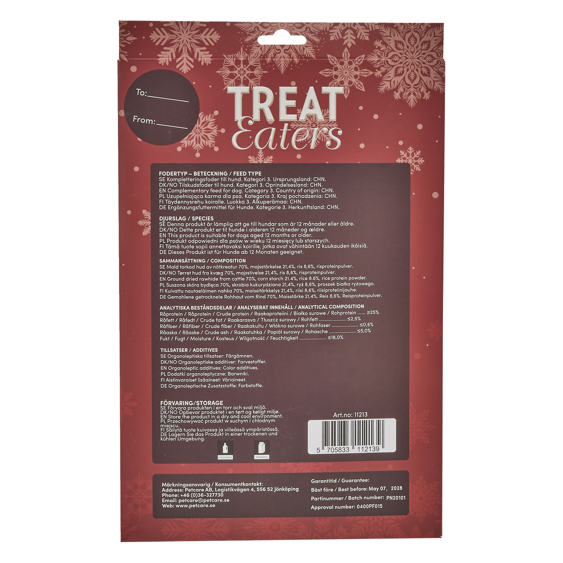 En röd Petcare-julkalender för hundar visar snöflingemönster tillsammans med produktdetaljer, en streckkod, förvaringsriktlinjer, företagsinformation samt "Till:" och "Från:"-rutor uppe till vänster.