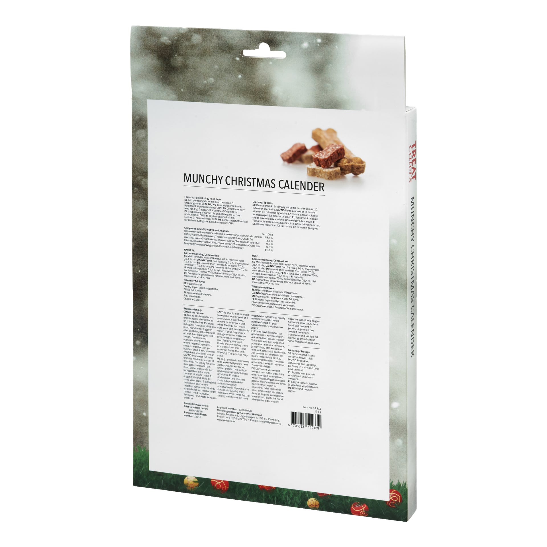 Baksidan av Petcares julkalender för hundar visar näringsdetaljer, ingredienser och användningsanvisningar, med ett foto av blandade torkade hundgodisar högst upp och festliga juldekorationer längst ner.