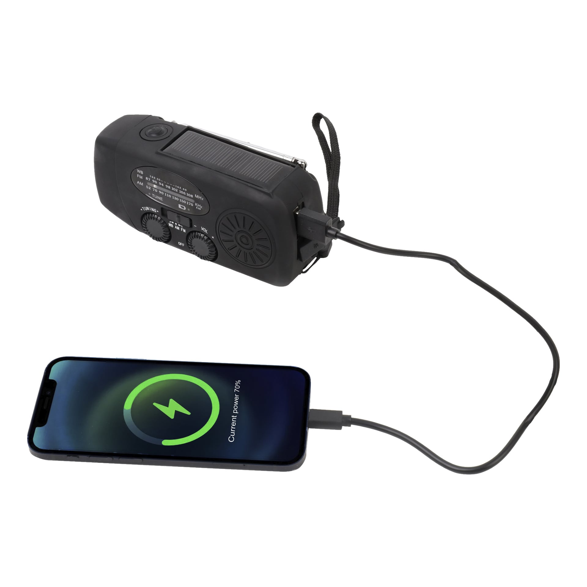 En svart uppdragbar FM-radio med solpanel laddar en smartphone via USB. Smartphonen visar en grön laddningssymbol och 70 % batteri. Radion har rattar, en högtalare och ett bärband.
