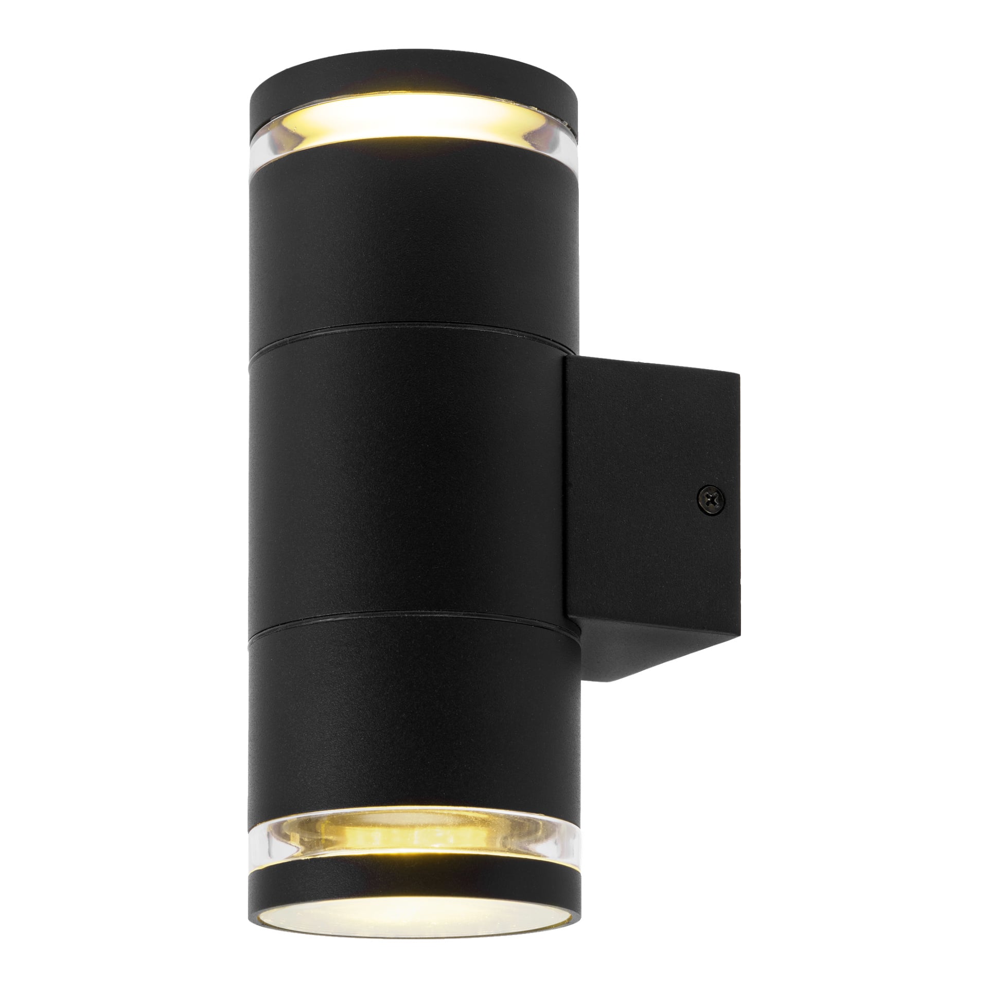 EKVIP Wall spotlight är en svart, cylindrisk utomhuslampa med klara sektioner i båda ändar som kastar varmt vitt ljus upp och ner. Den är fäst vid en fyrkantig bas.