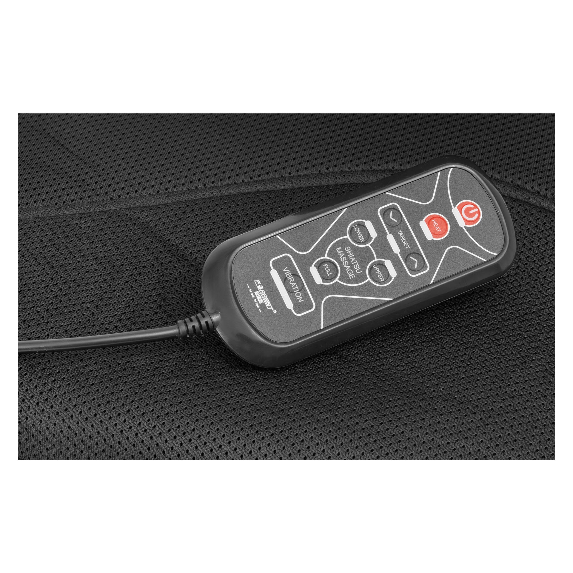 Bright Massage Cushion med Heats trådbundna fjärrkontroll, som tydligt visar knappar för vibration, ström, läge och olika massagealternativ, ligger på en svart texturerad yta.