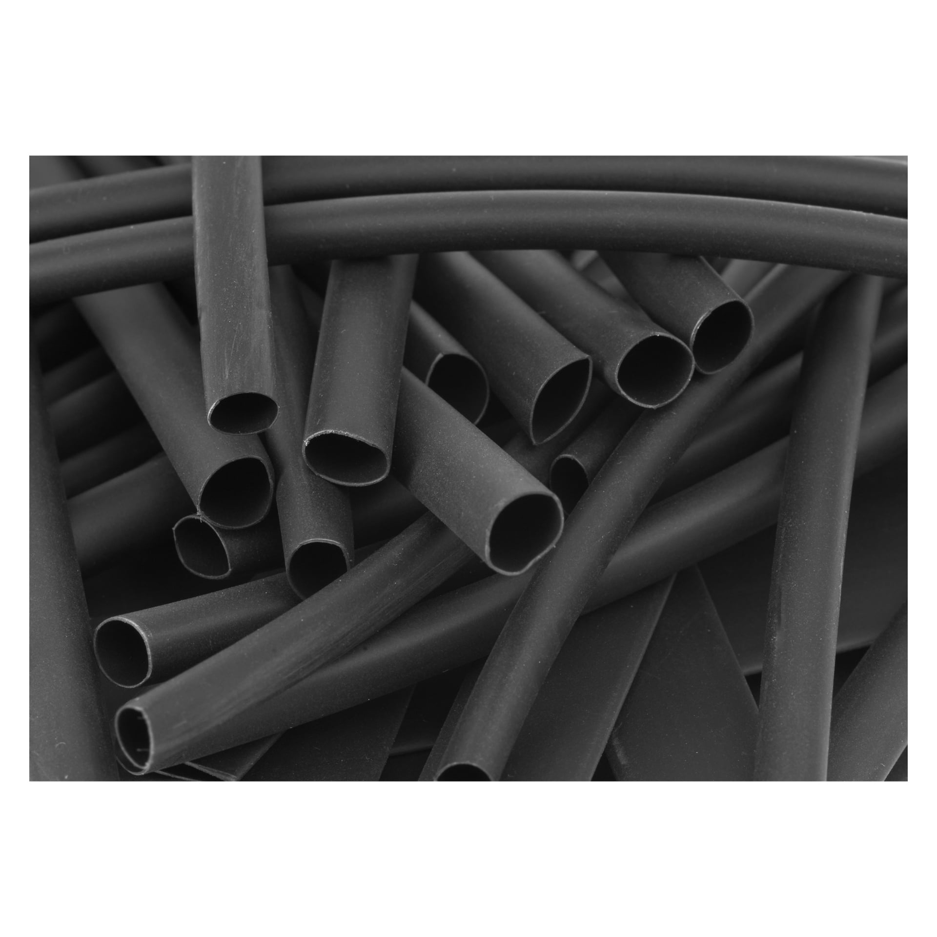 En detaljerad närbild av flera Anslut Heat Shrink Tube 80 Pack-delar utspridda i olika riktningar, överlappande varandra.