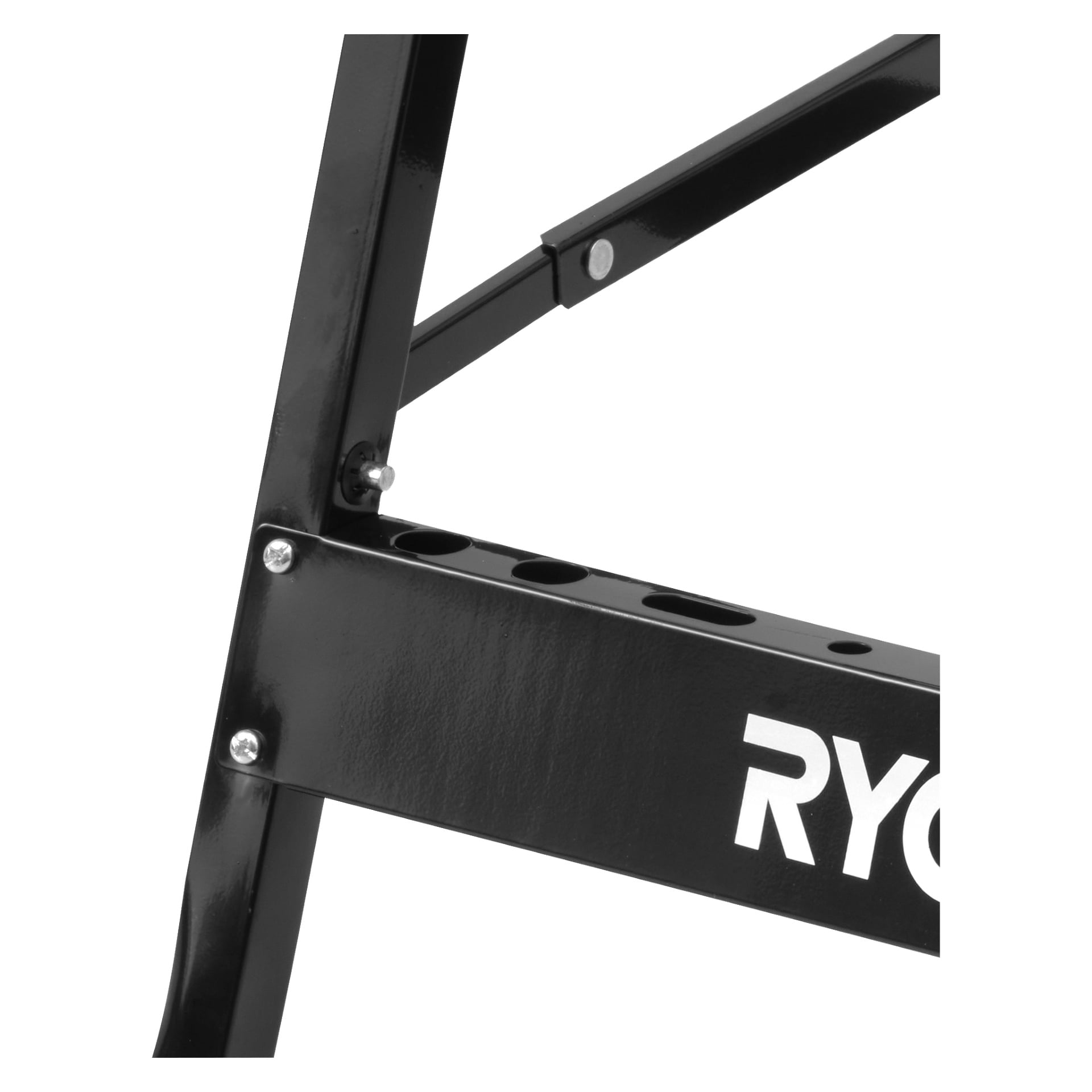 Szczegółowy widok czarnej metalowej ramy Ryobi Foldable Workbench RWB02, ukazujący fragment logo RYOBI. Poziomy pręt nośny wyposażony jest w śruby i okrągłe otwory, co podkreśla jego solidną, przemysłową konstrukcję.
