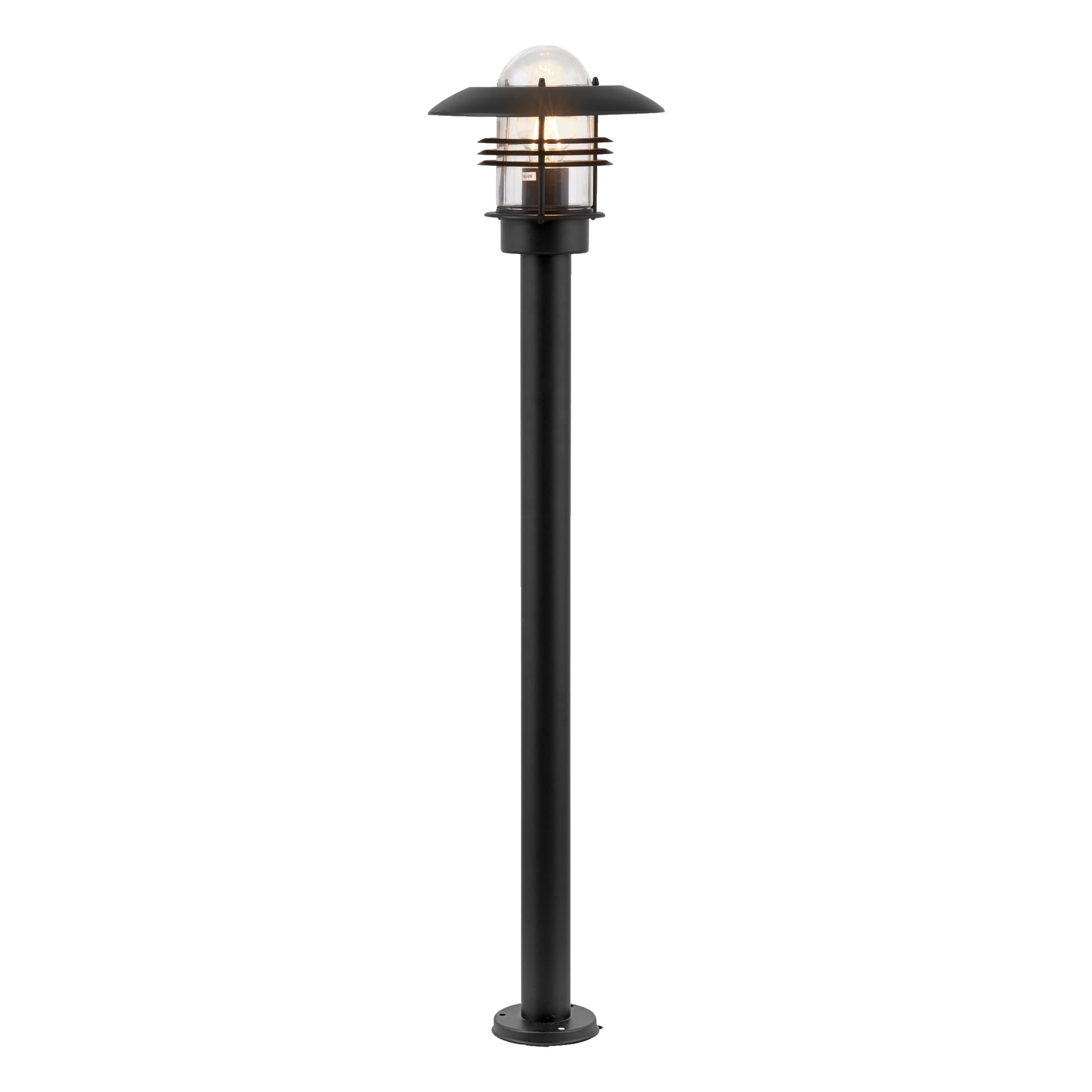 EKVIP-lyktstolpen är en svart utomhuslampa med en cylindrisk bas, en klar glaskupol omgiven av metallringar och krönt med en plan cirkulär yta. Lampan är tänd.
