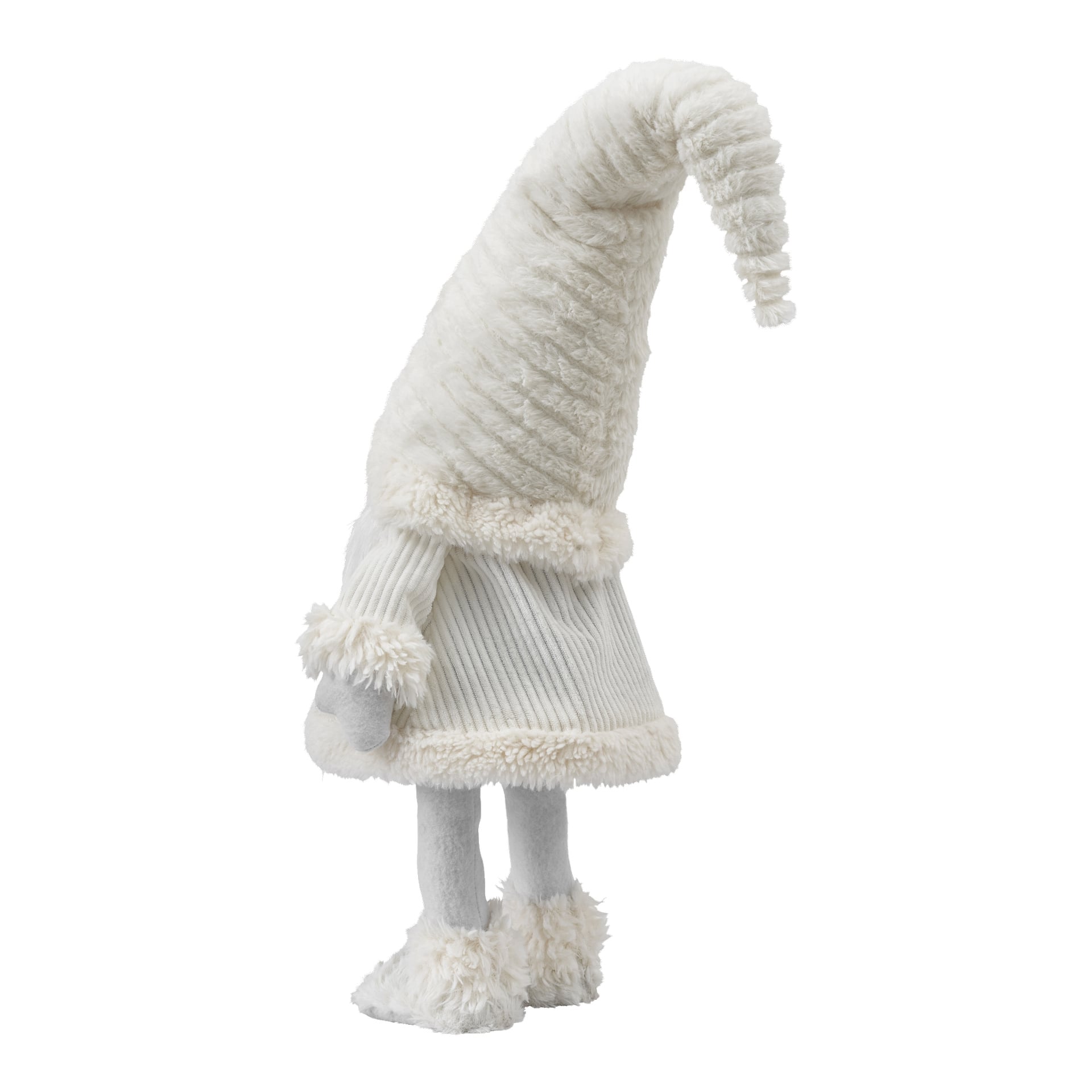 En sidoprofil av EKVIP Wobbling Santa-figuren visar dess mjuka design med en helt vit texturerad kappa och en hög, slok spetsig hatt. Figuren är detaljerad med lurviga manschetter, matchande stövlar och fuskpälsdetaljer på rocken.