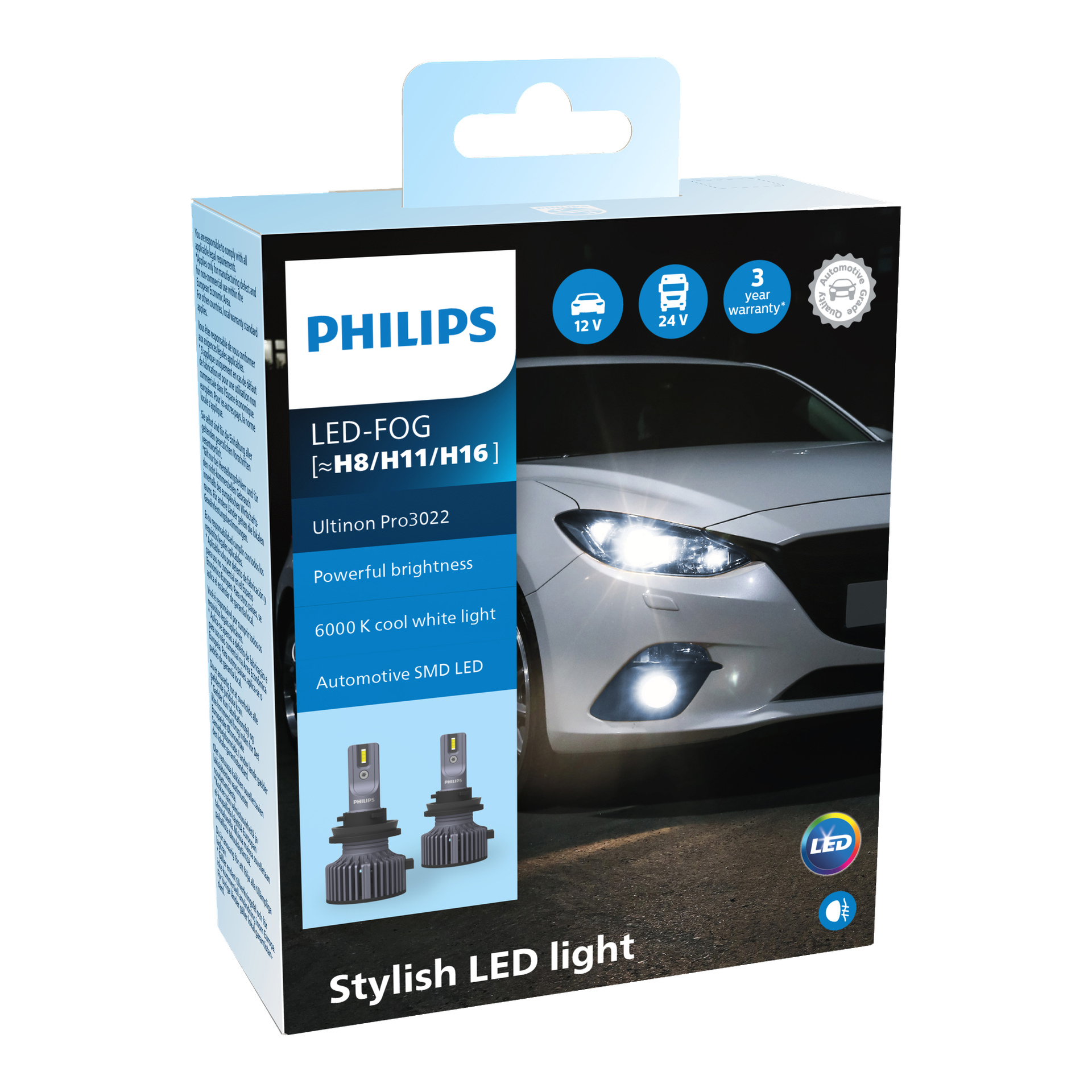 Philips Cars strålkastarlampa LED Ultinon Pro3022 2-pack i detaljhandeln visar en bil med tända strålkastare, två LED-lampor, en badge som anger 3-års garanti och symboler för kompatibilitet med både 12V- och 24V-fordon.