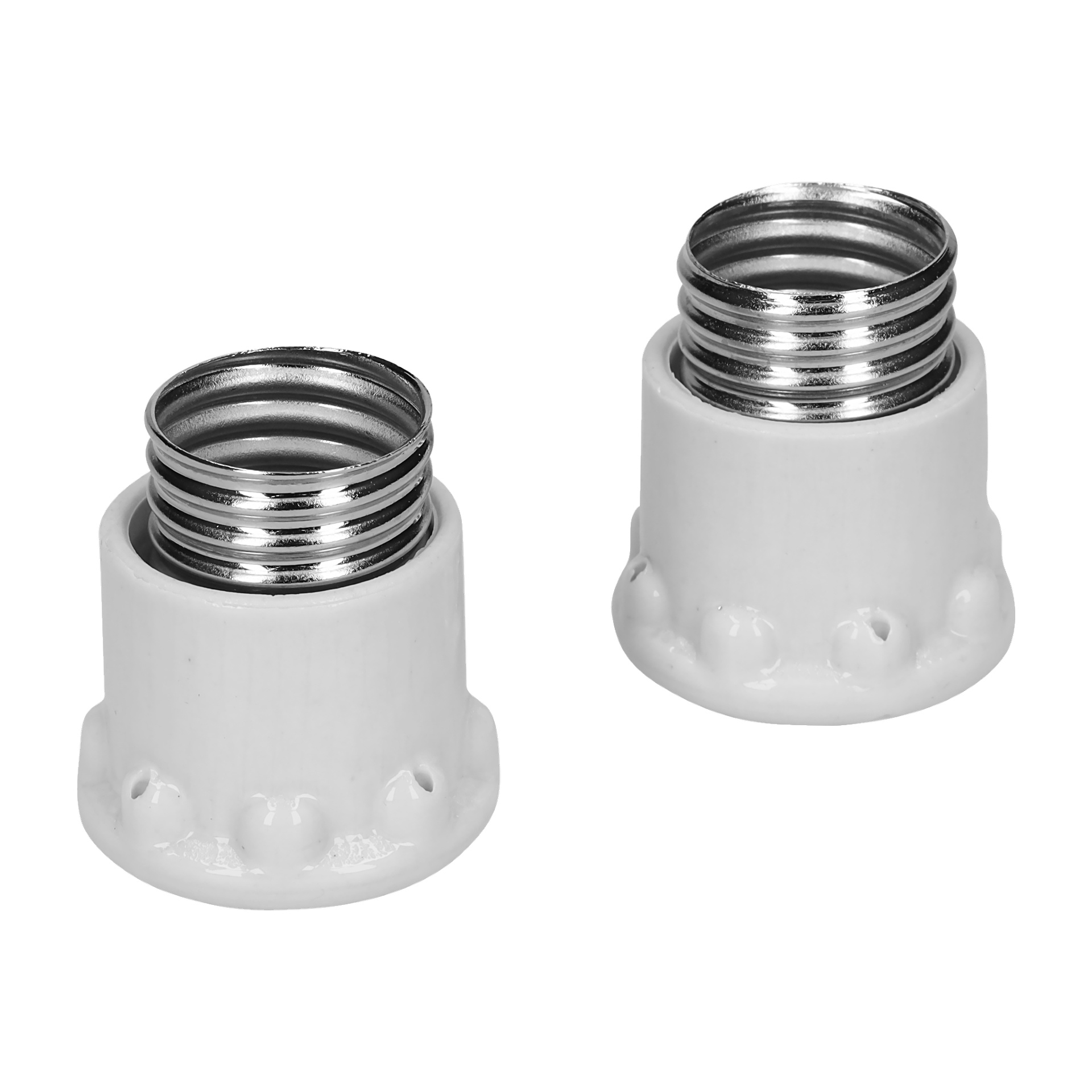 Två Ifö-plugglock från en 2-pack, gjorda av vit keramik, har en cylindrisk design med metallskruvbasar och tydliga spår nära botten.