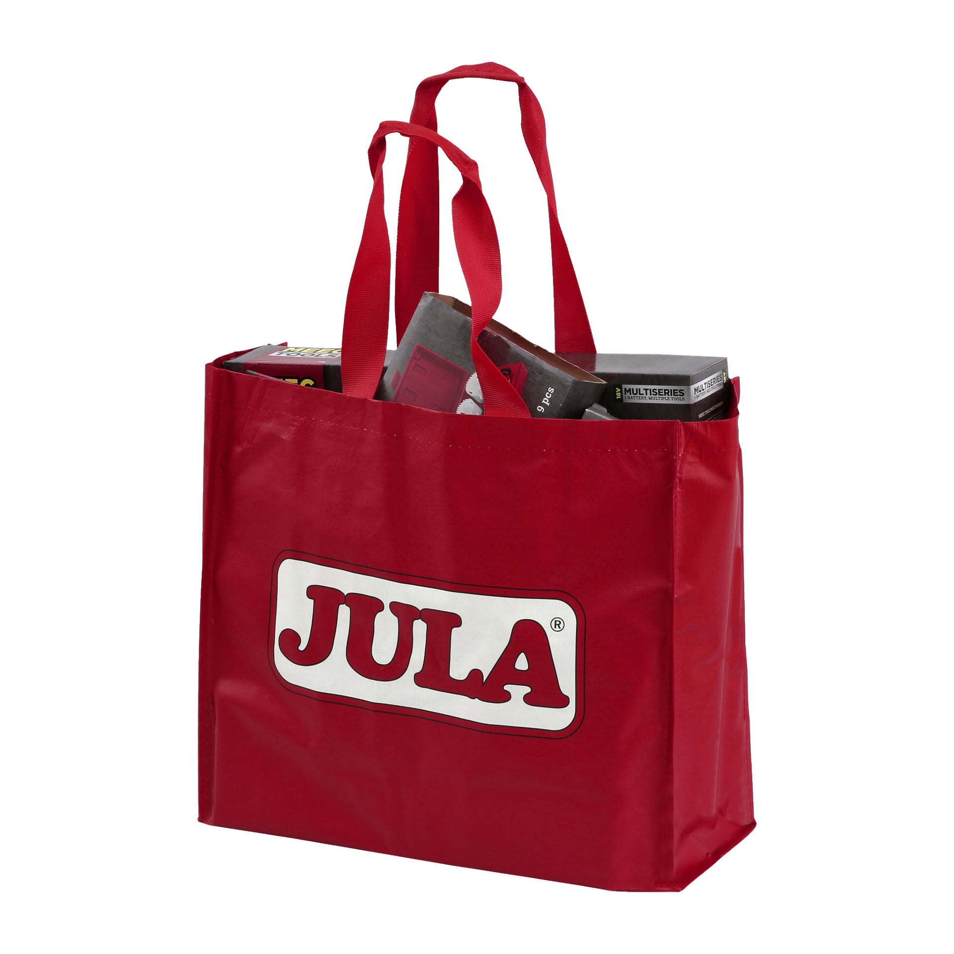 En återanvändbar jula-väska med två handtag, med Jula-loggan i vitt, står upprätt och fylls med olika saker, inklusive lådor och paket.