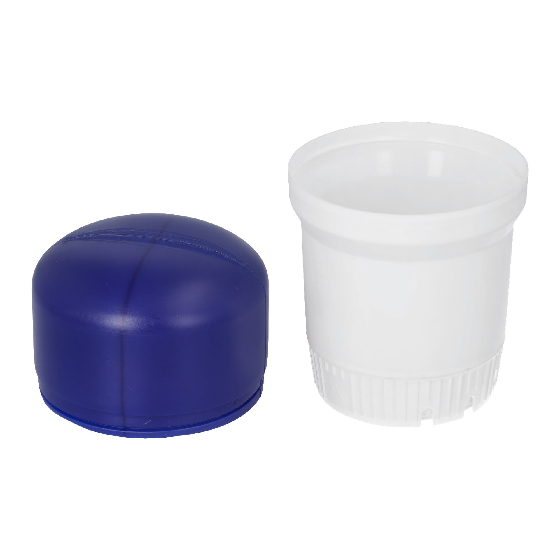 En Kayoba Floating dispenser placeras bredvid en blå plastlock.