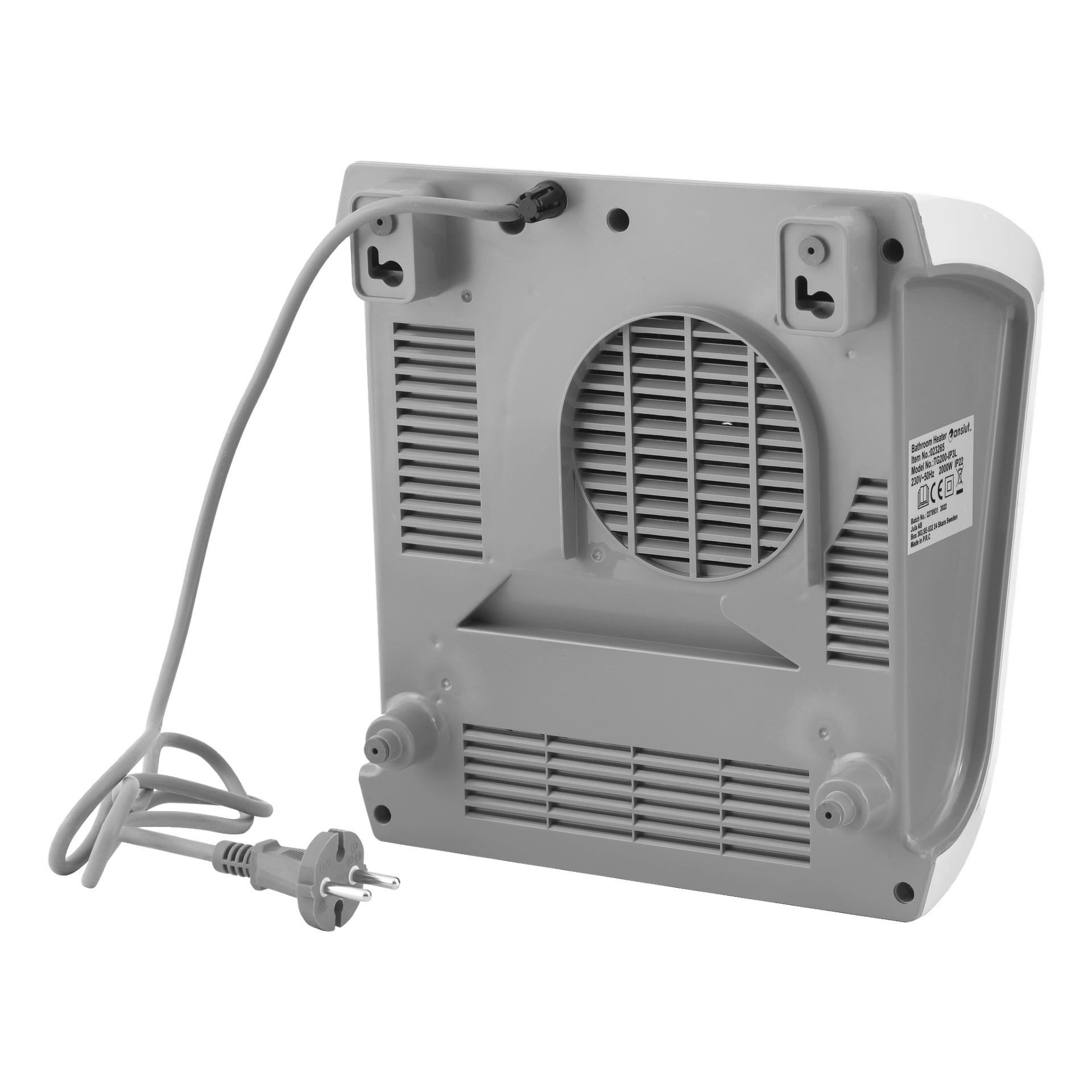 Baksiden av Anslut Bathroom heater vises, med en sentral ventil, en synlig strømkabel som ender i en plugg, og to gummiføtter hvilende på den overveiende grå kroppen. Skruer kan sees, sammen med en etikett med produktinformasjon plassert på høyre side.