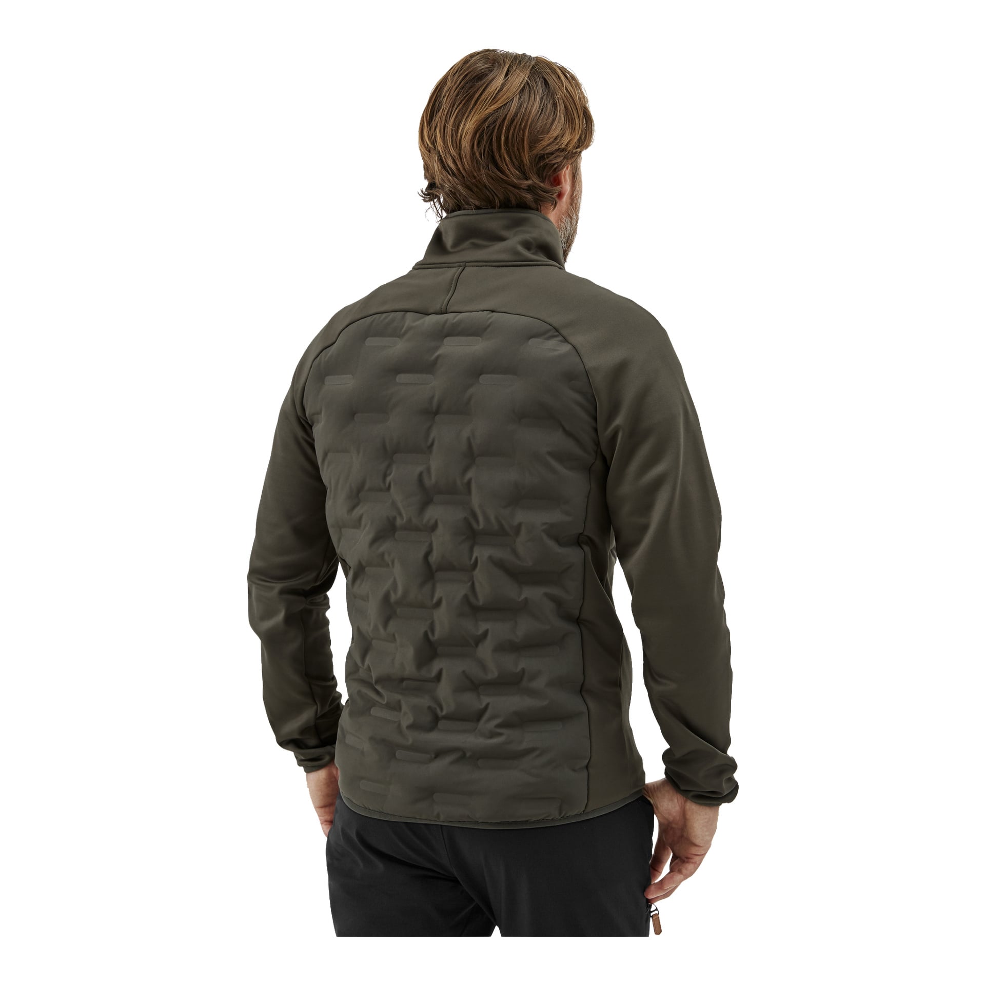 En person med brunt hår syns bakifrån iklädd Kayoba Outdoor Men's hybrid Särna-jacka i mörkgrönt, med vadderad textur och hög krage, tillsammans med svarta byxor. Deras armar är naturligt böjda vid armbågarna.