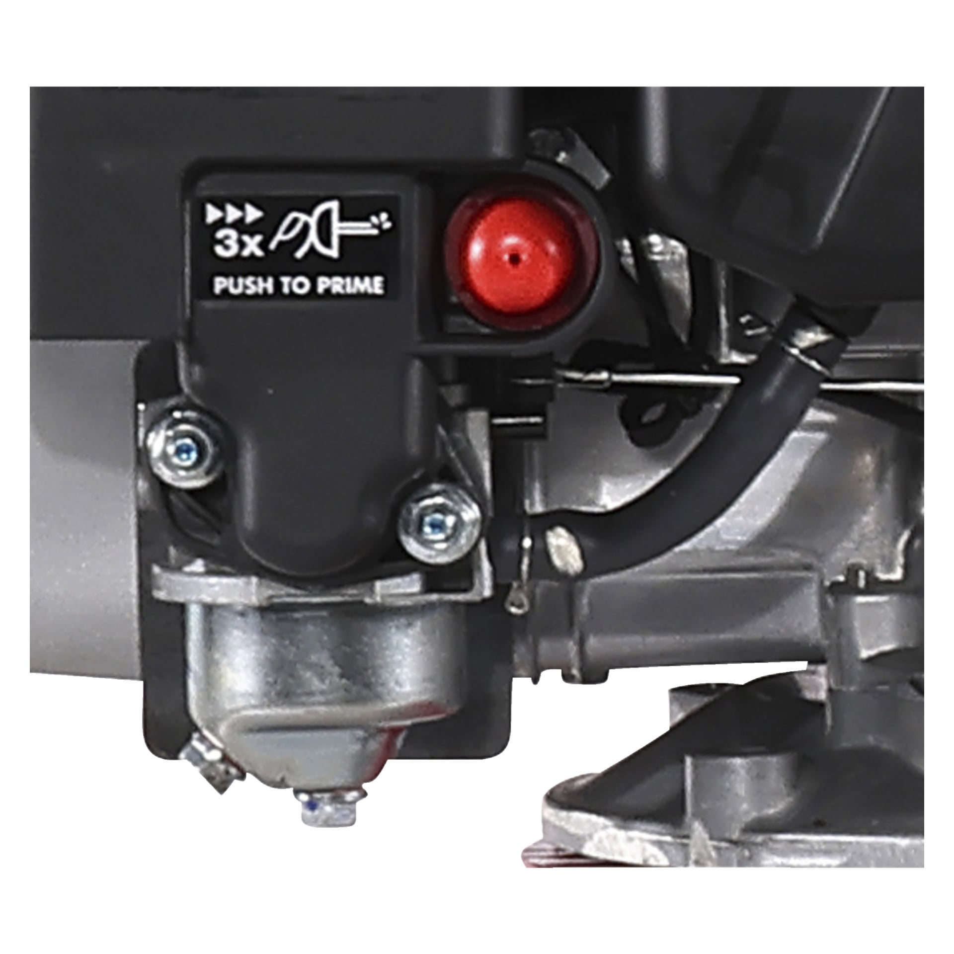 Detaljerad närbild av en mekanisk motordel från en Meec Tools Rotavator, med en röd primerknapp märkt PUSH TO PRIME tillsammans med en ikon som visar att man ska trycka tre gånger. Runt knappen finns flera metalldelar, skruvar och en svart slang.
