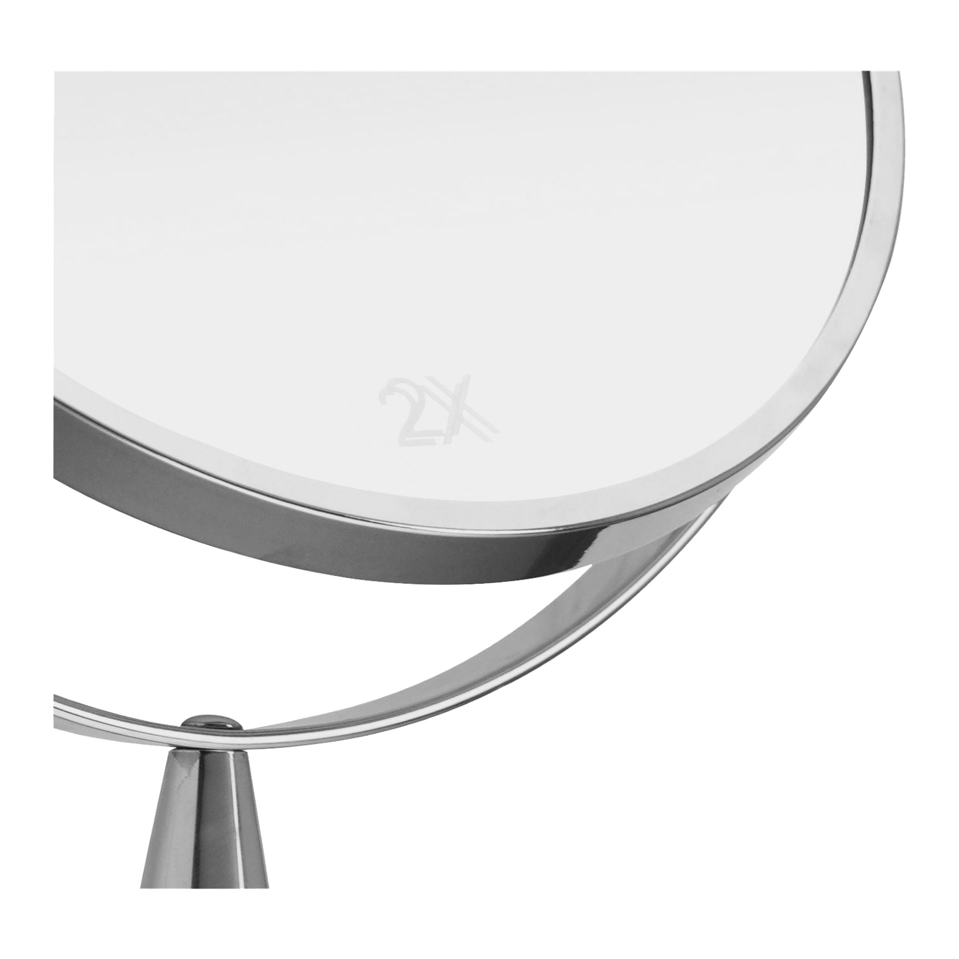 En detaljerad vy av EKVAP-spegeln, med sin cirkulära dubbelsidiga design, 2X-förstoringsetikett och delvis synlig metallram och stativ.