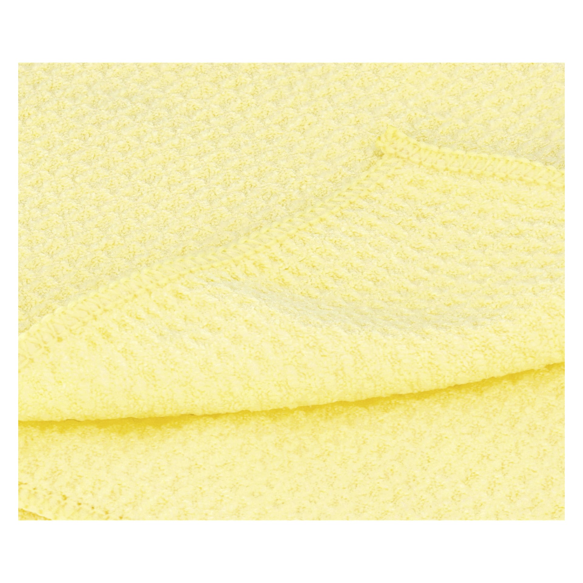 Detaljerad närbild av ett gult Hamron Microfiber-tyg, som visar dess vikta hörn, våffeltexturerade yta och prydligt sydda kanter.