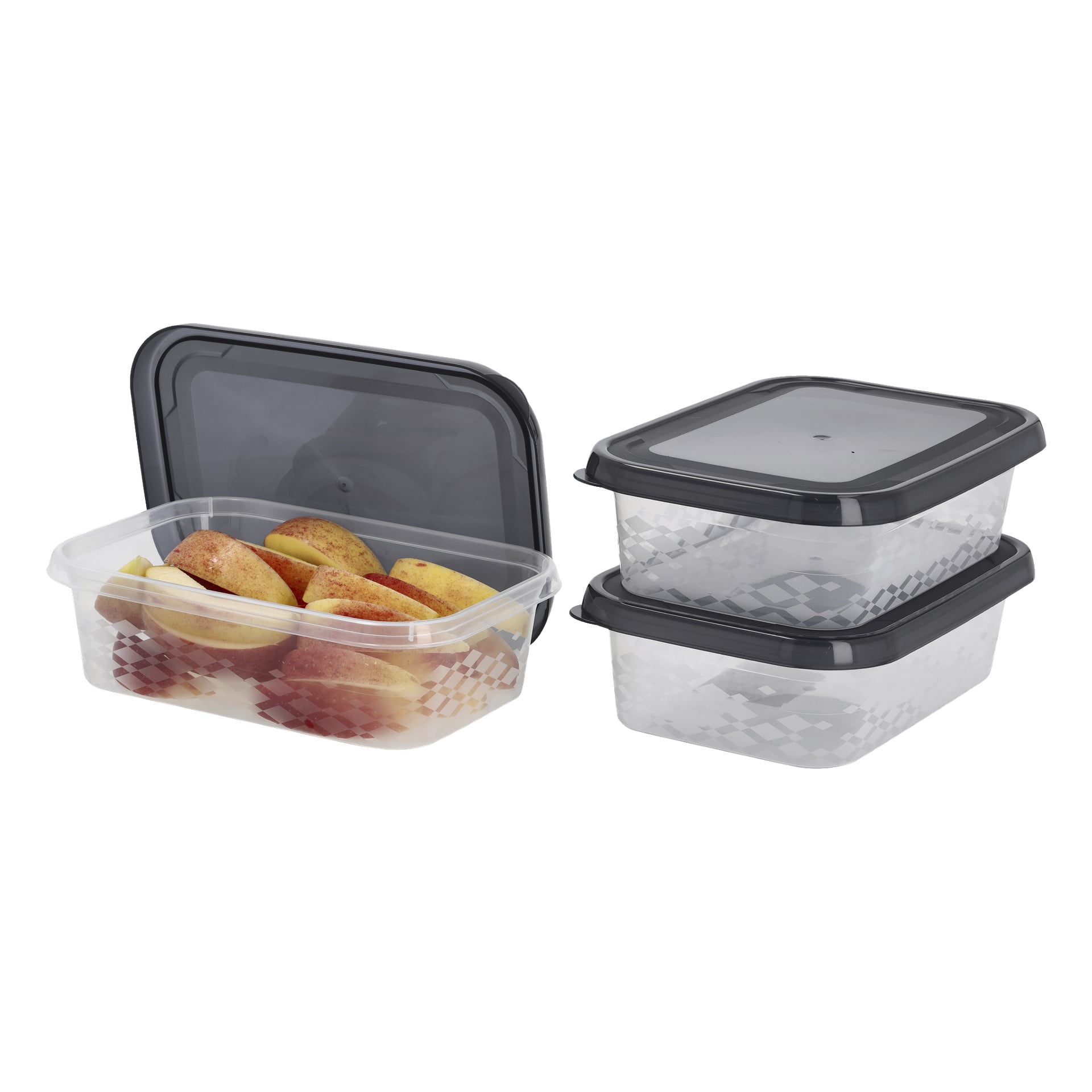 Tre Menuett Lunchbox-lådor visas upp, varav en är öppen och innehåller skivade äpplen, medan de andra två är stängda och staplade ovanpå varandra. Varje lunchlåda har ett svart lock och geometriska sidomönster.