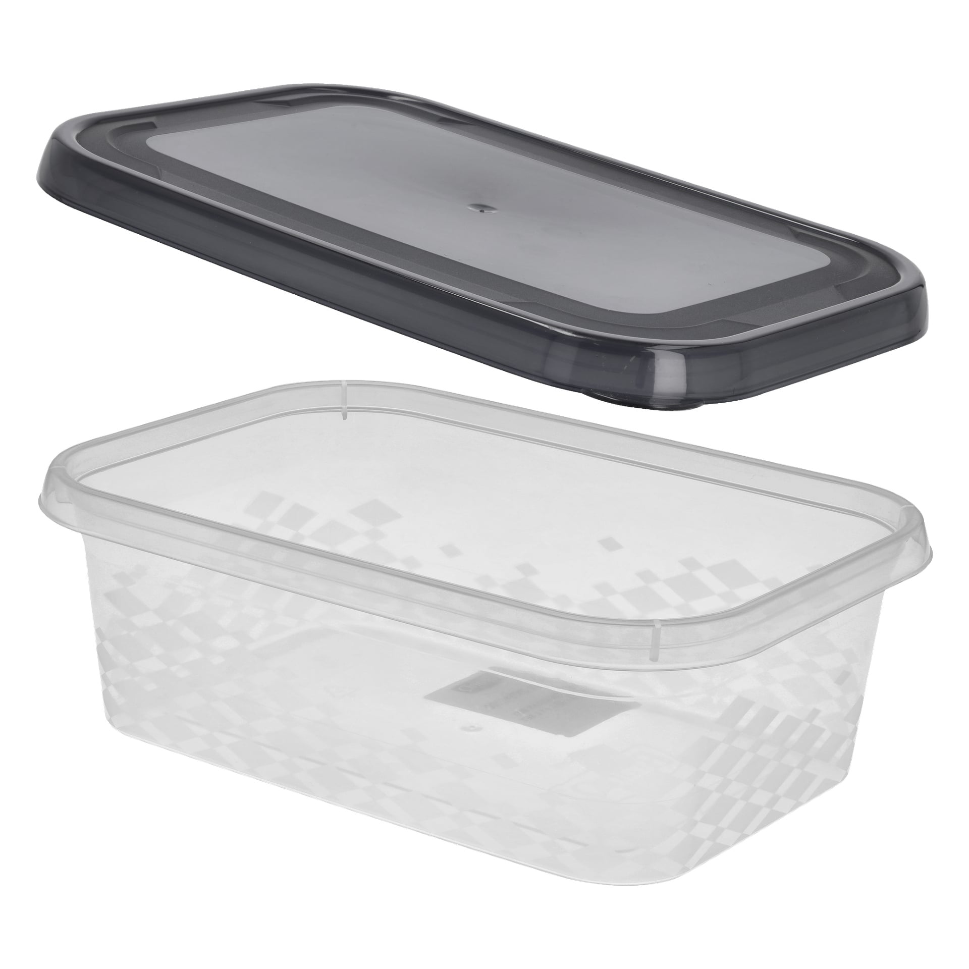 En transparent rektangulär Menuett Lunchbox med ett mörktonat, halvgenomskinligt lock placerat ovanför. Lådan har mjukt rundade hörn och ett svagt geometriskt mönster på sidorna.