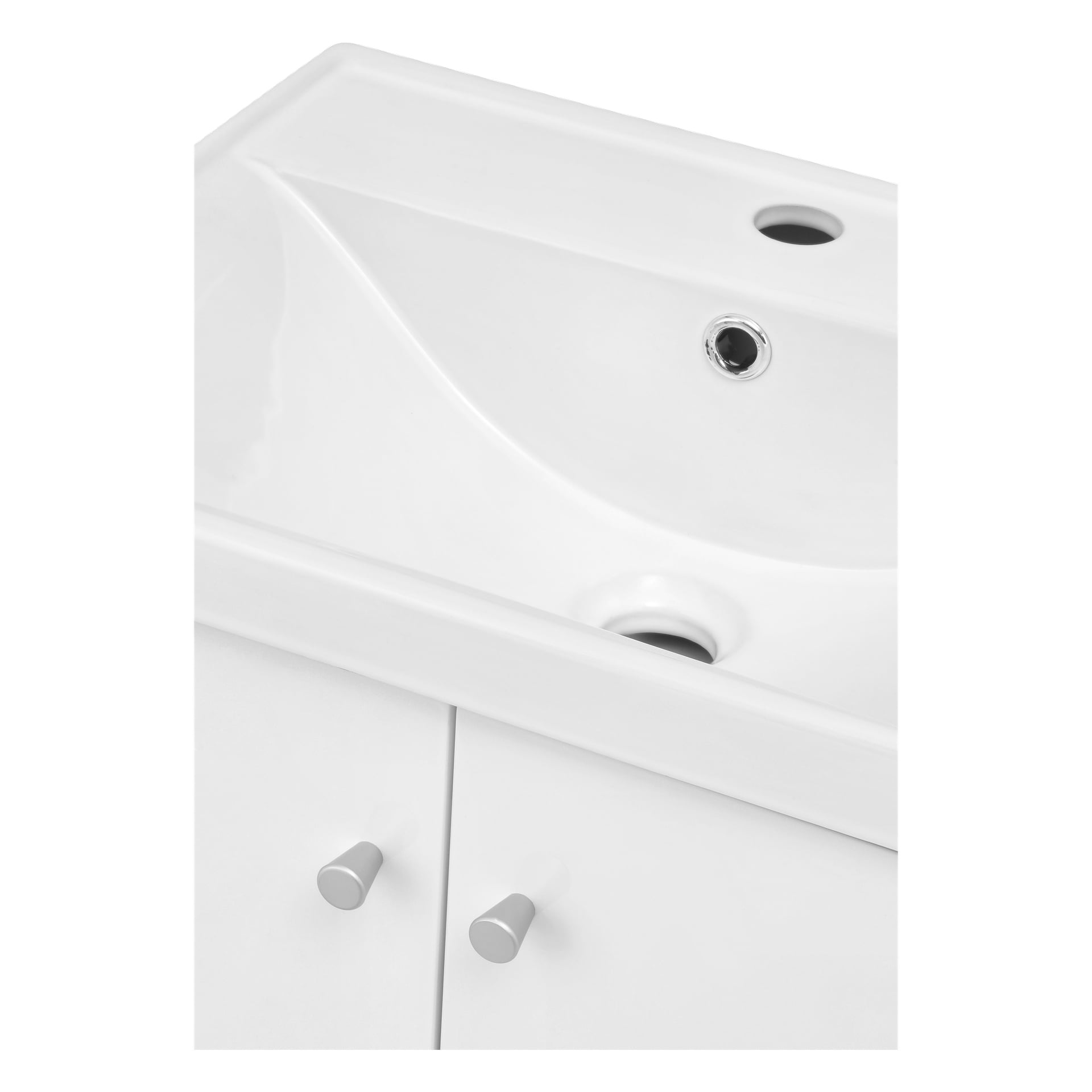 Eine Nahaufnahme des EKVIP Badezimmersets zeigt ein weißes Waschbecken mit speziellen Löchern für Überlauf, Abfluss und Wasserhahn. Unter dem Waschbecken befinden sich zwei Schranktüren, jede mit einem einfachen runden Griff ausgestattet.
