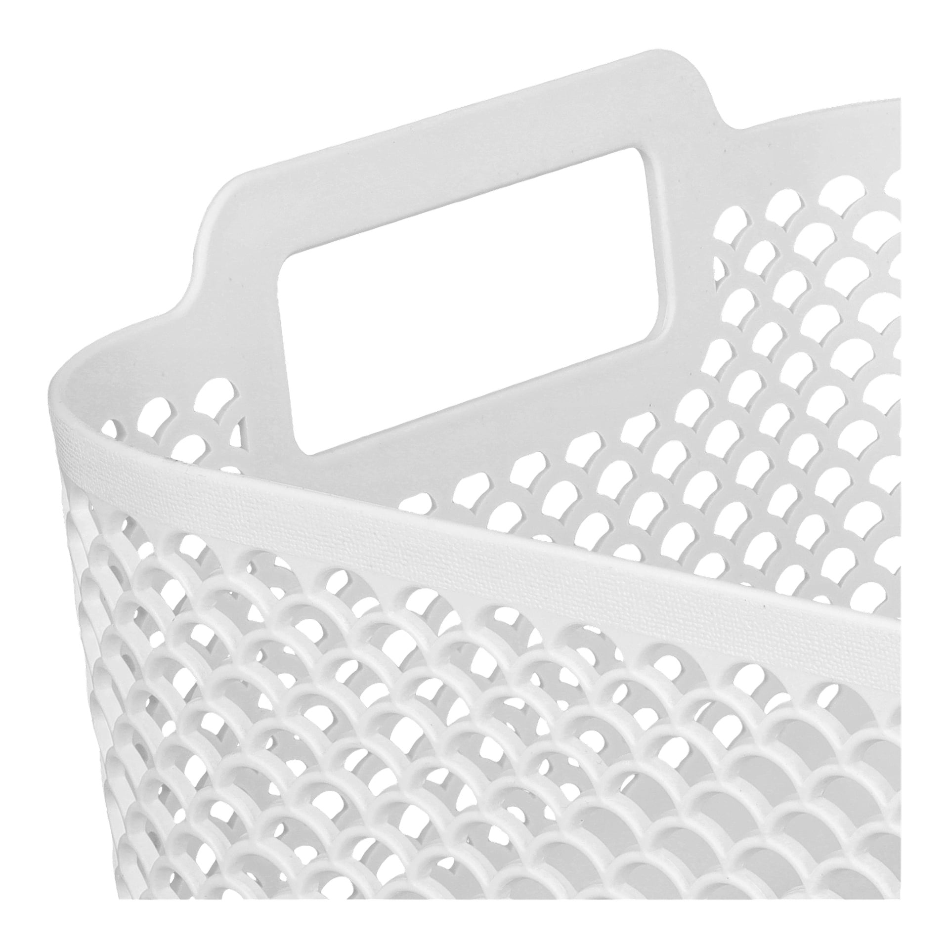 Zbliżenie na kosz Hard Head Storage pokazuje jego białą plastikową obudowę z prostokątnym uchwytem i rzędami małych, zaokrąglonych otworów po bokach. Kosz jest pokazany z góry pod kątem.