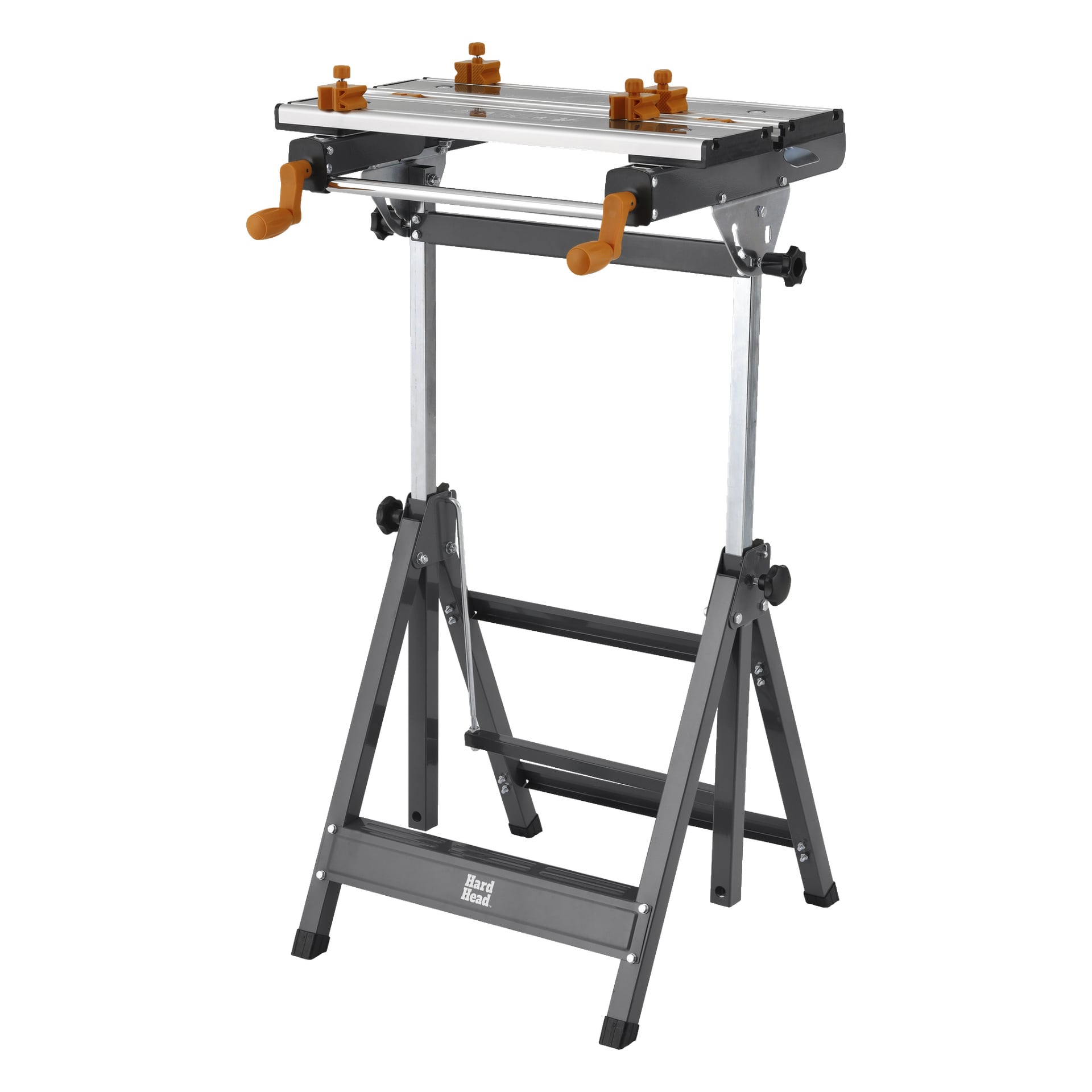 En svart och silverfärgad Hard Head fällbar arbetsbänk med orange handtag och justerbara klämmor står på fyra ben, med varumärket synligt på den nedre korsstången.