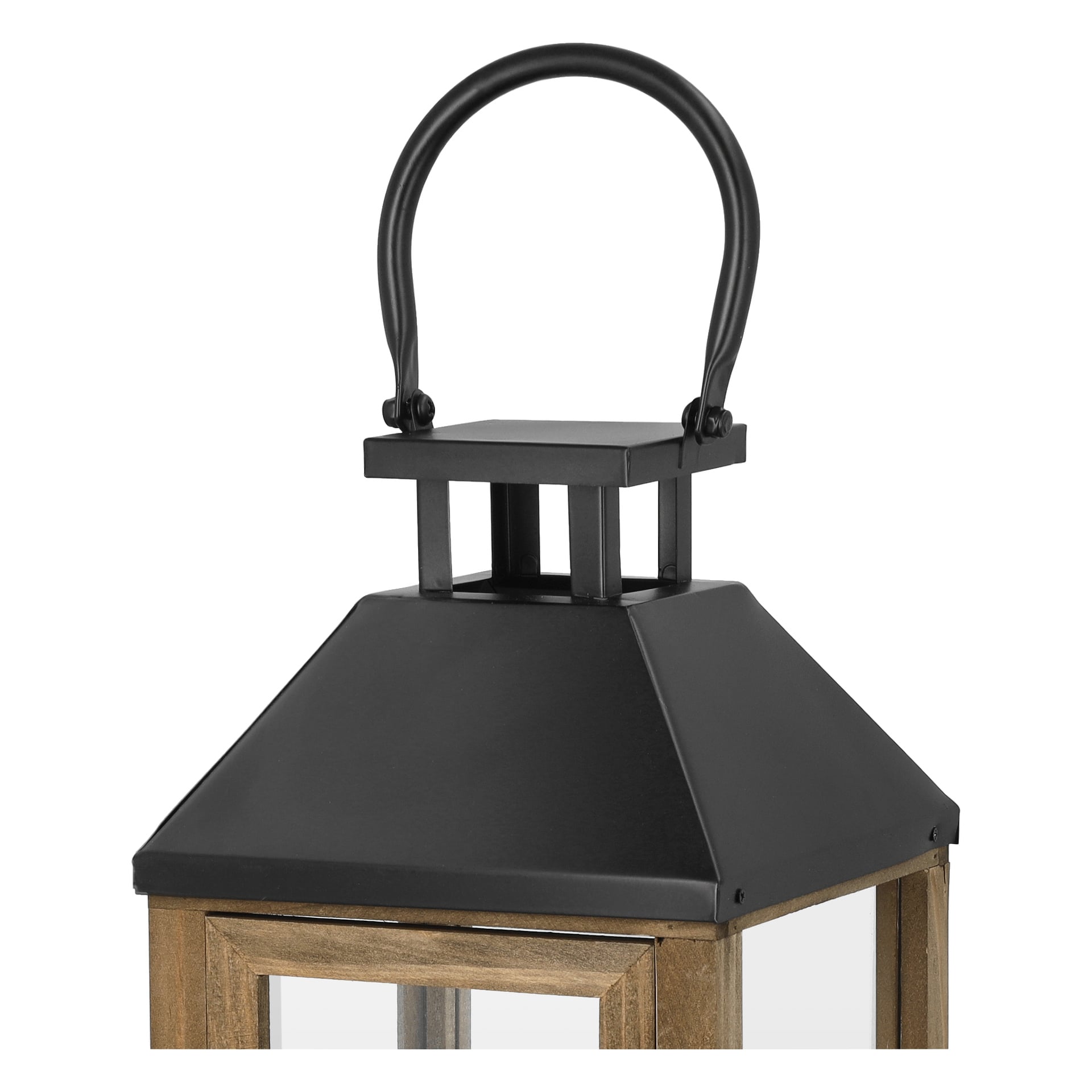 En närbild av EKVIP Lantern visar dess träram, klara glaspaneler, ett svart plåttak format som en pyramid och ett böjt handtag högst upp.