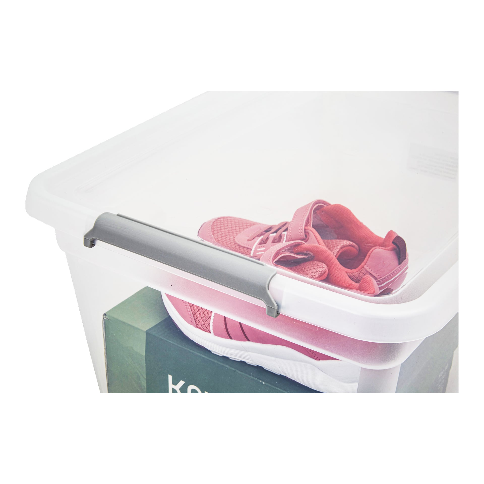 Pinke Sportschuhe stehen auf einer grünen Schuhschachtel, alle in einer Hard Head Aufbewahrungsbox mit Deckel platziert.