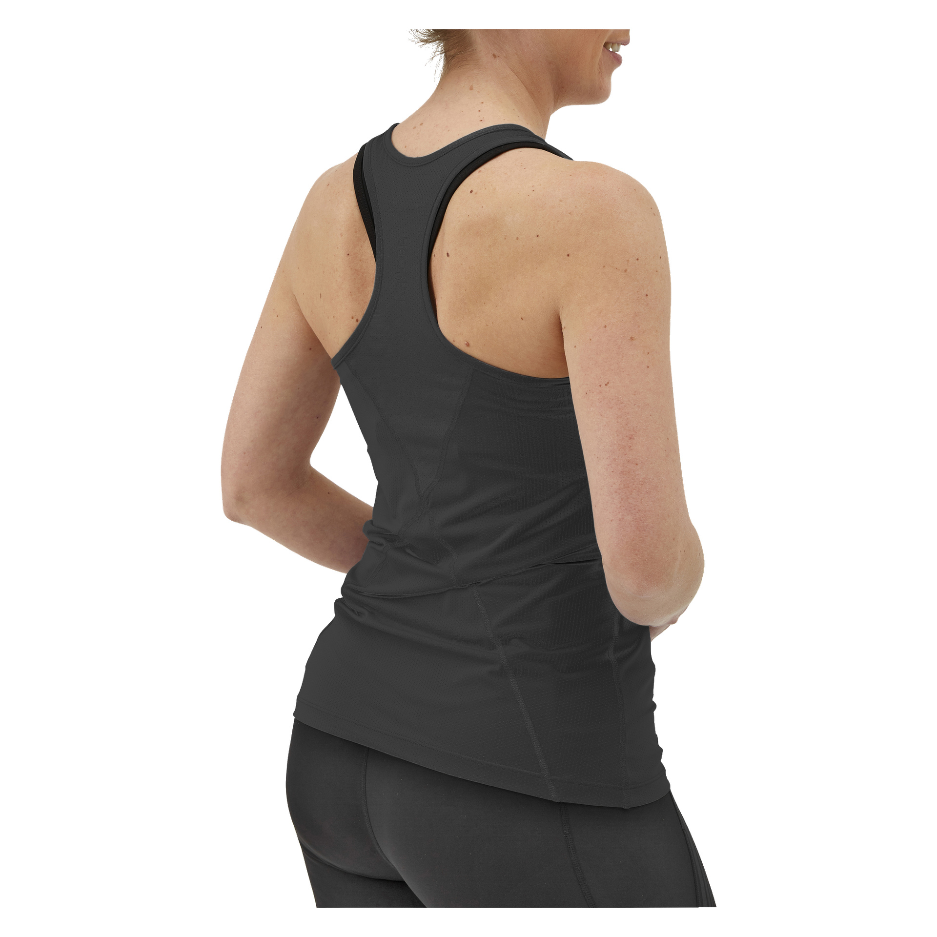En person syns bakifrån, klädd i Kayoba Women's Training Top Albany i svart och matchande svarta leggings.