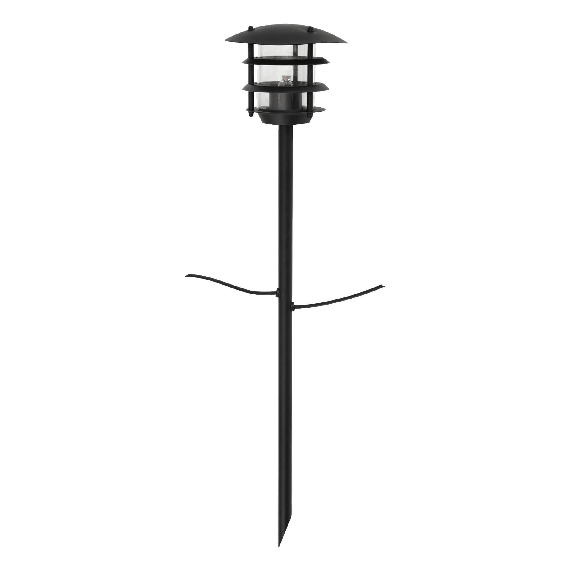 lampa ogrodowa od Anslut Bollard Connectable System, zaprojektowana z okrągłą, wielowarstwową amortyzacją i przezroczystą szklaną obudową. Lampa stoi na wysokim paliku z wąską podstawą do wbijania się w ziemię, a do palka podłączone są dwa zakrzywione pręty nośne.