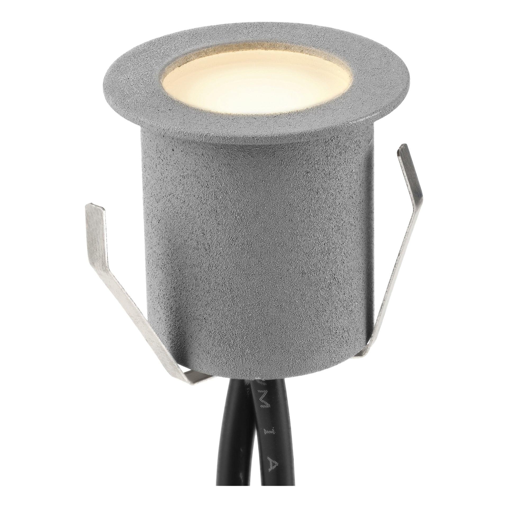 En kompakt sylindrisk grå LED innfelt lampe fra Anslut Decklights Connectable System 4-pakke, vist med en glødende sirkulær front, to metallfjærklips på sidene og svarte elektriske ledninger som stikker ut fra basen.