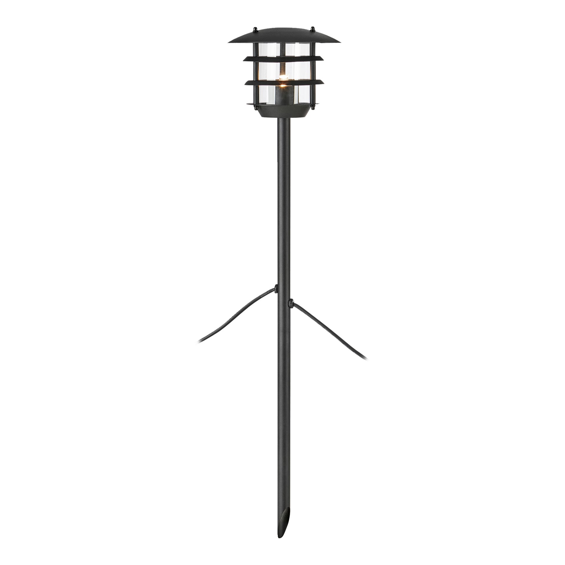 En svart utomhusträdgårdslampa från Ansluts Bollard Connectable System, med en cylindrisk glasskärm, metalltopp och tre stödjande metallarmar för markpåle.