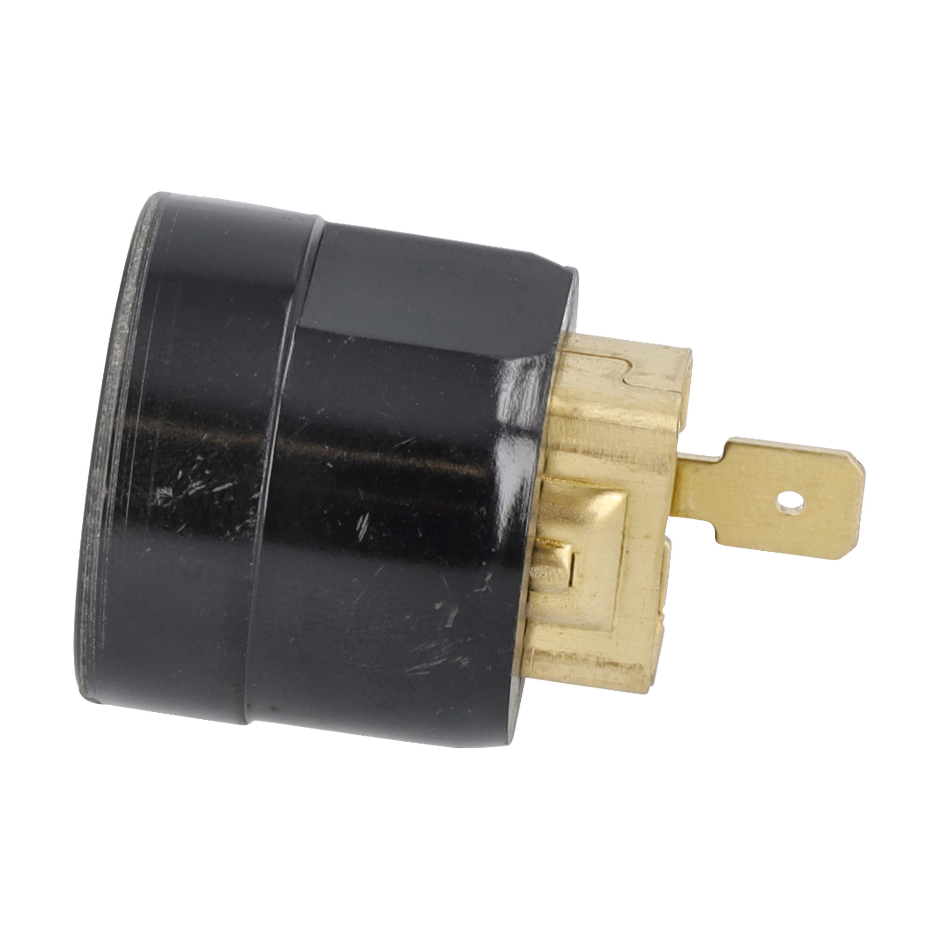 Närbild på Carbon Holder F. 017523, en svart cylindrisk kontaktadapter med messingstaggar och synliga anslutningspunkter.