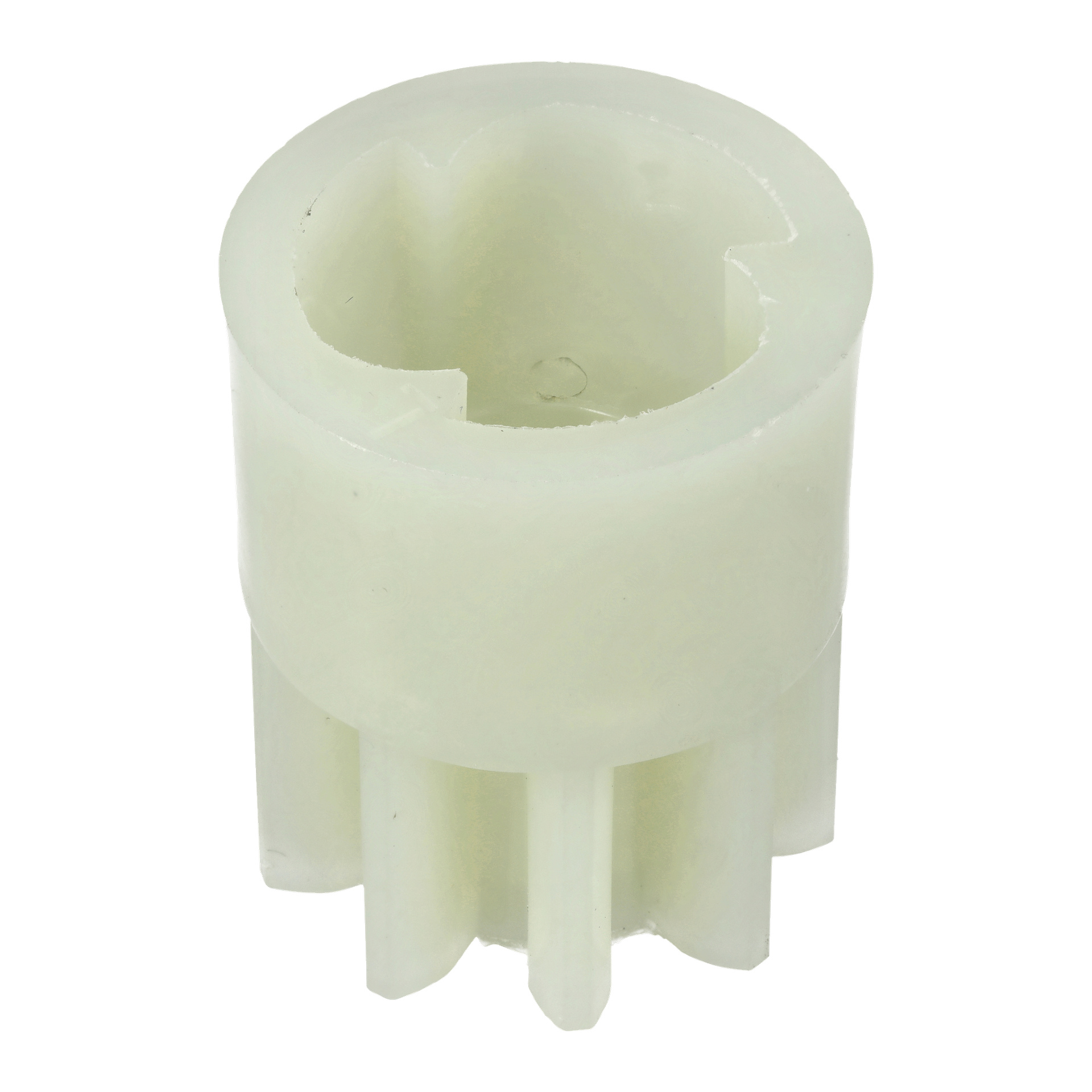 Närbild av Drive Left F. 022198: genomskinlig cylindrisk plastkugghjul med sex yttre tänder, ihålig urtagning i mitten, matt finish.