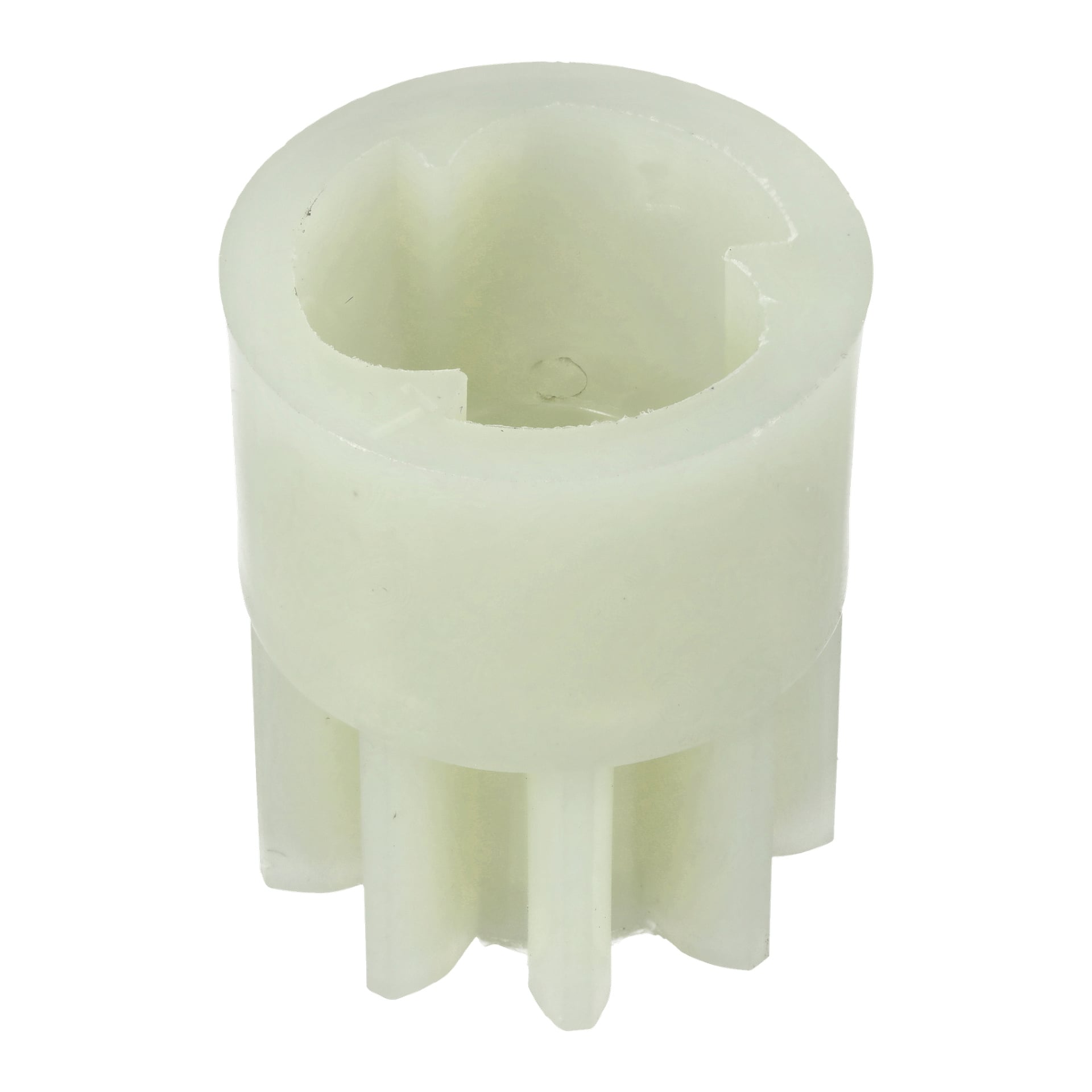 Närbild av Drive Left F. 022198: genomskinlig cylindrisk plastkugghjul med sex yttre tänder, ihålig urtagning i mitten, matt finish.