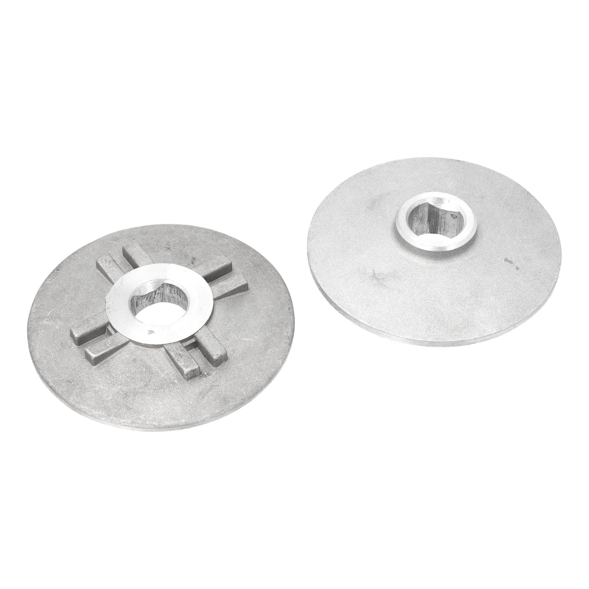 Bladskiva Inner/Ut-015654: Två runda metallskivor med hexagonala hål i mitten; den ena har fyra upphöjda åsar, den andra är slät.