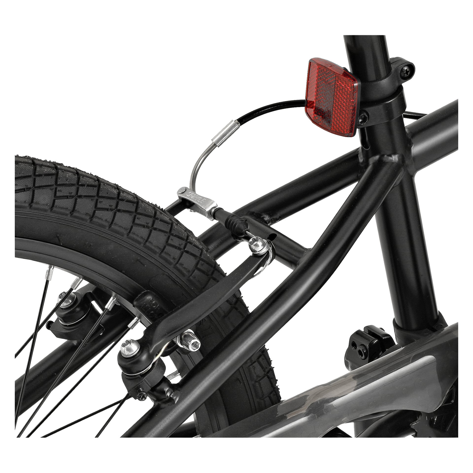 Detaljerad vy av Kayoba BMX-cykelns bakhjul, med mönstermönster, bromssystem, slank svart ram och en röd reflektor placerad under sadeln.