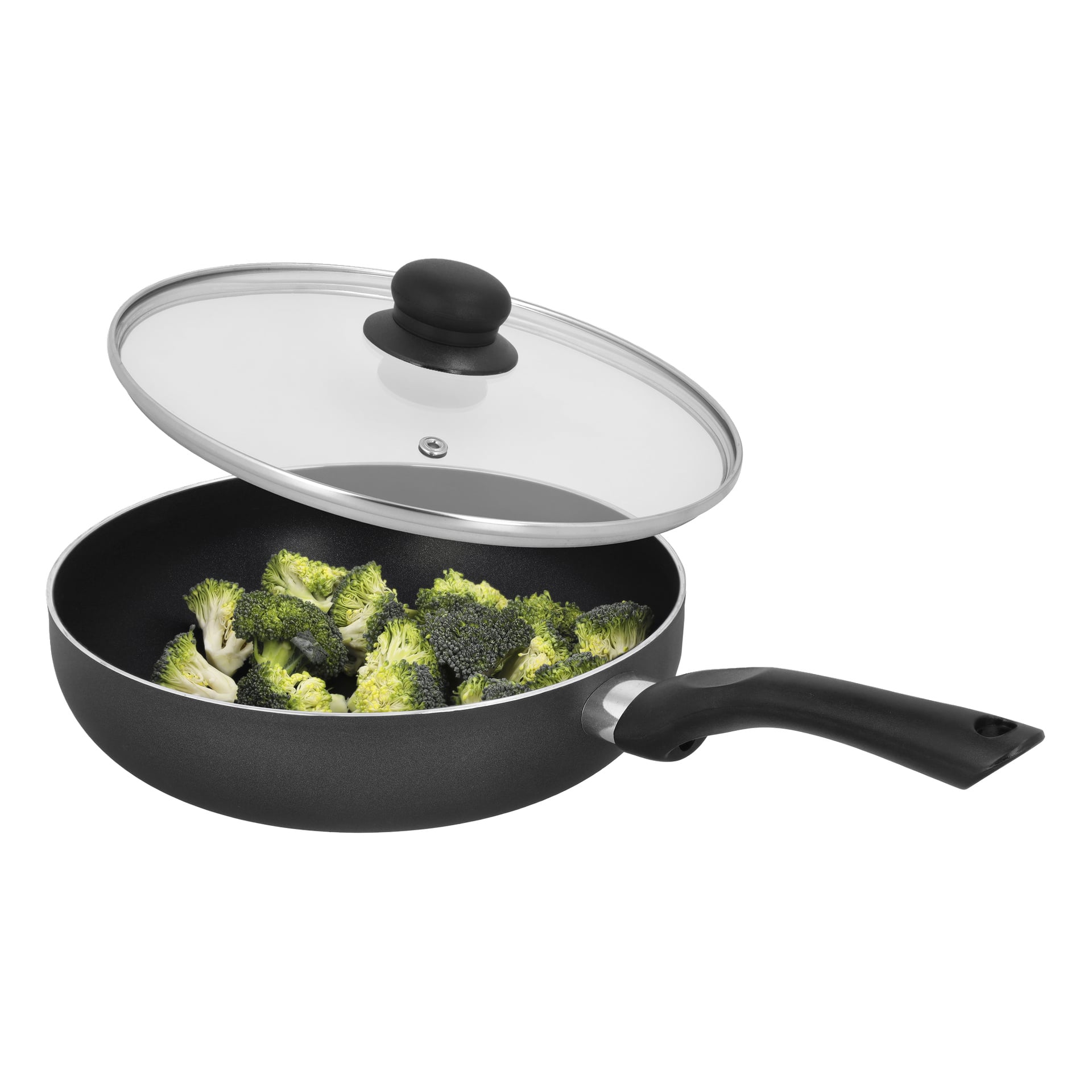 En svart keramisk sautépanna med lock från Menuett innehåller broccolibuketter. Glaslocket är något öppet, med en svart ratt och ångventil, och handtaget pekar åt höger.