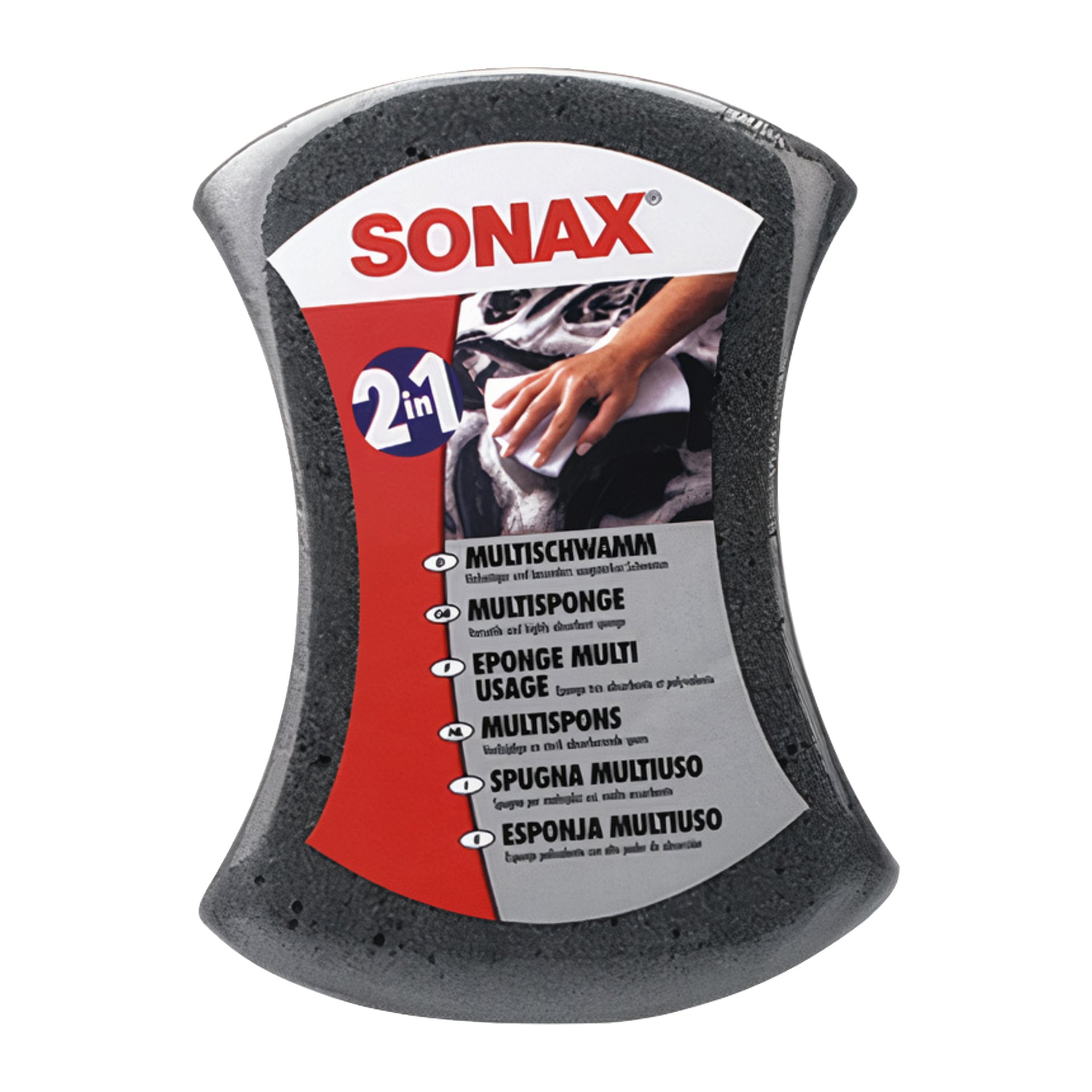 En svart och grå Sonax Cleaning Sponge 2-i-1, med etiketttexten "Cleaning Sponge 2 in 1" och en bild som visar en hand som rengör en bil.