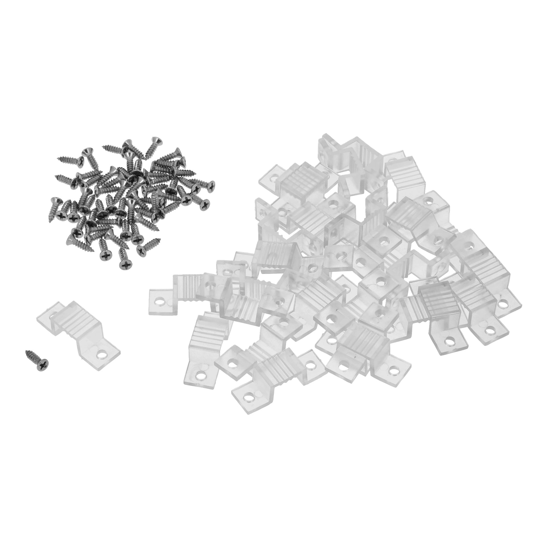 Ein Cluster kleiner Metallschrauben sitzt neben gerippten, durchsichtigen Kunststoffhalterungen mit Löchern, alles Teile des Anslut LED-Leuchtstreifen-Sets.
