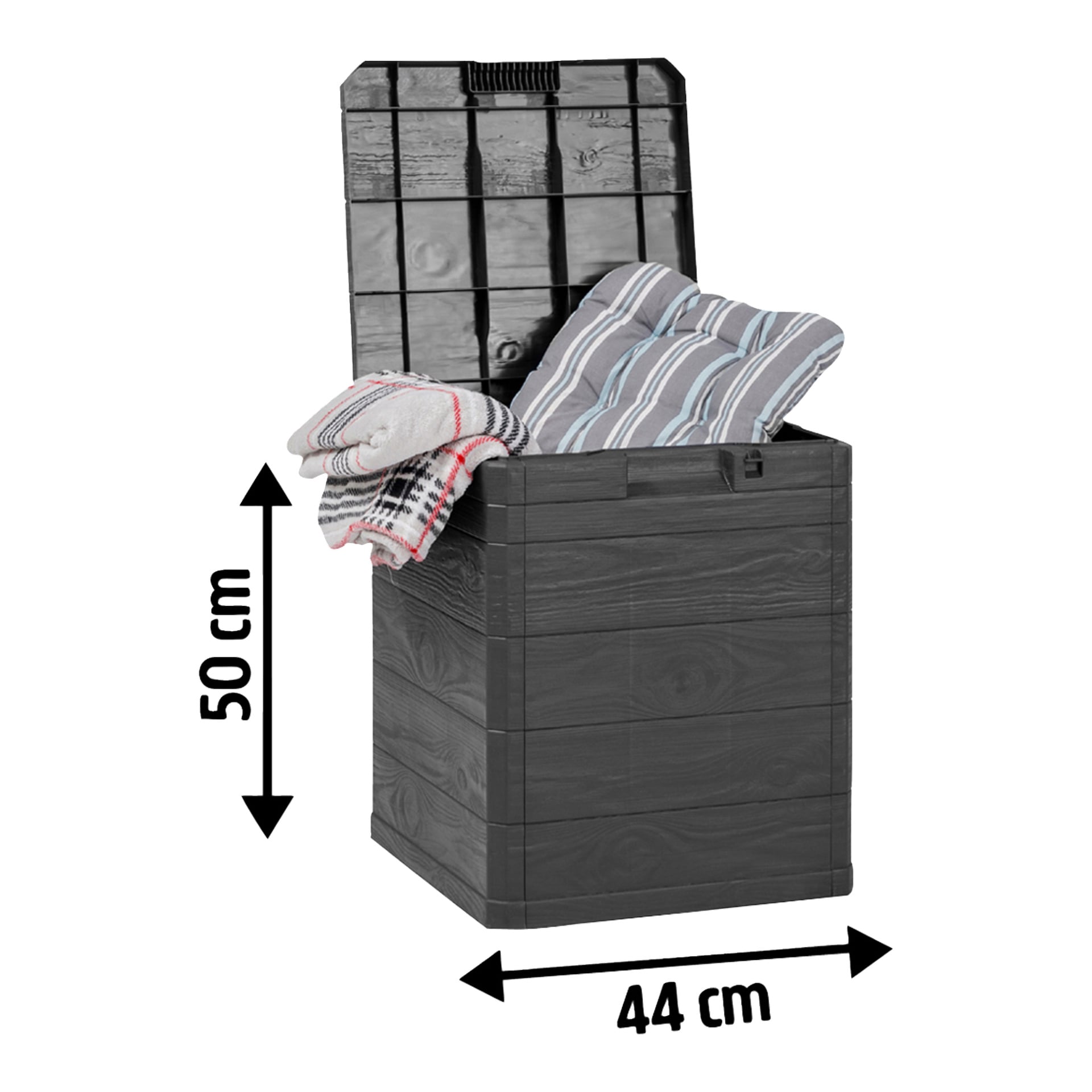 En svart Hard Head Cushion-boks med delvis åpent lokk viser foldede puter og et teppe inni; størrelsen er 50 cm høy, 44 cm bred.