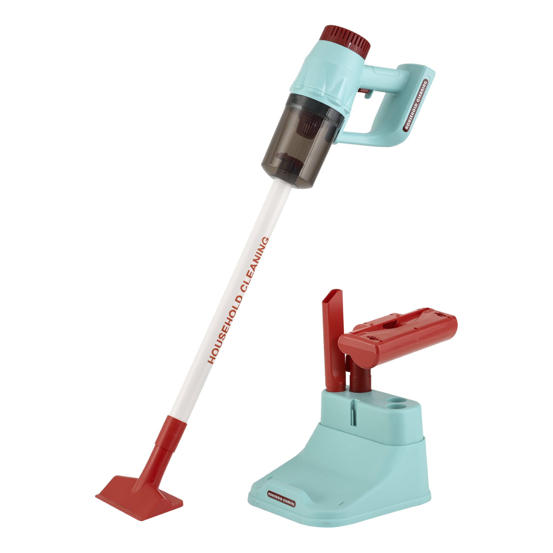 En röd och teal Kayoba leksaksdammsugare står upprätt bredvid sin laddningsbas, med "HOUSEHOLD CLEANING" på röret.