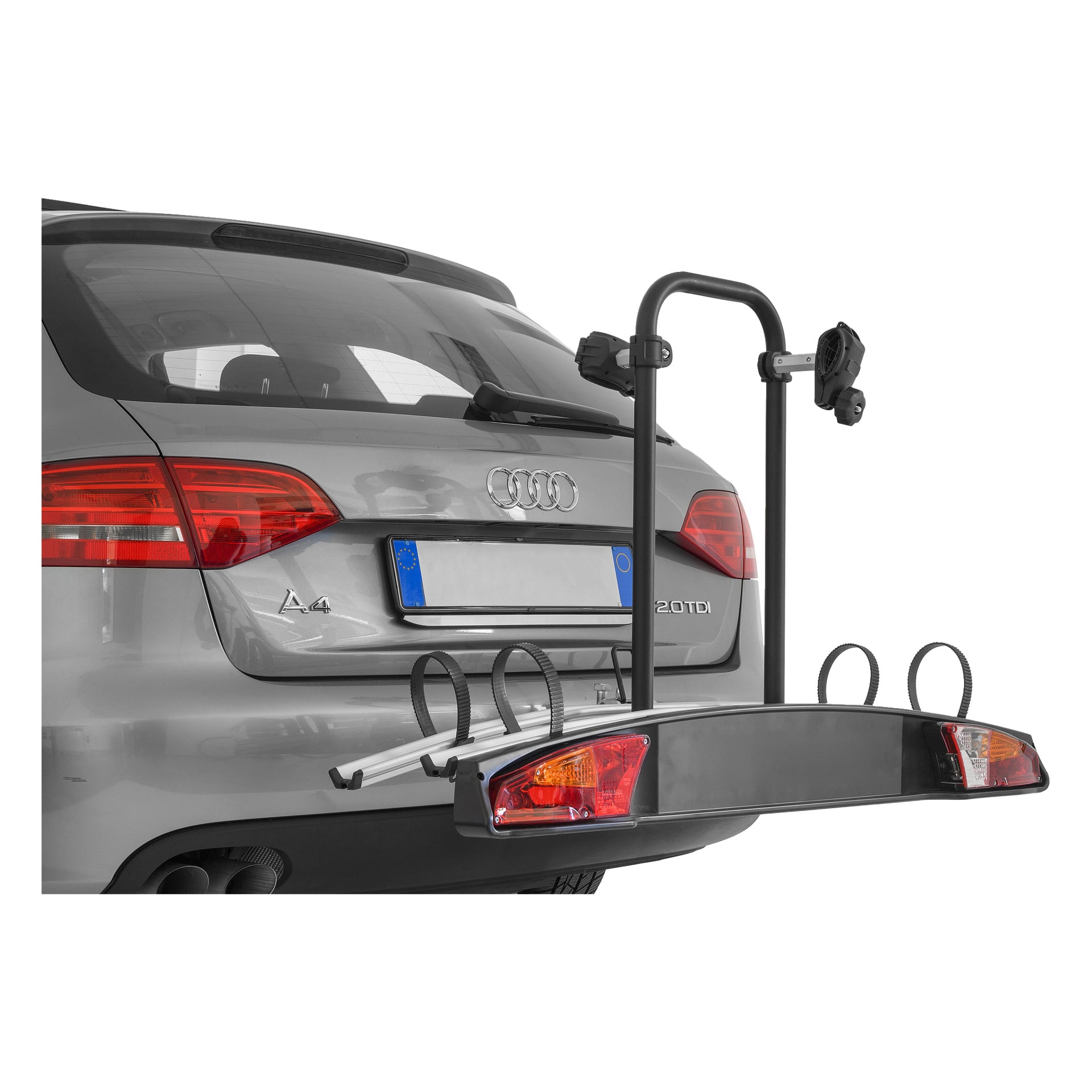 Bakre av en grå Audi A4 med Hamron sykkelstativ, sirkulære håndtak, synlige baklys og uskarp bilskilt.