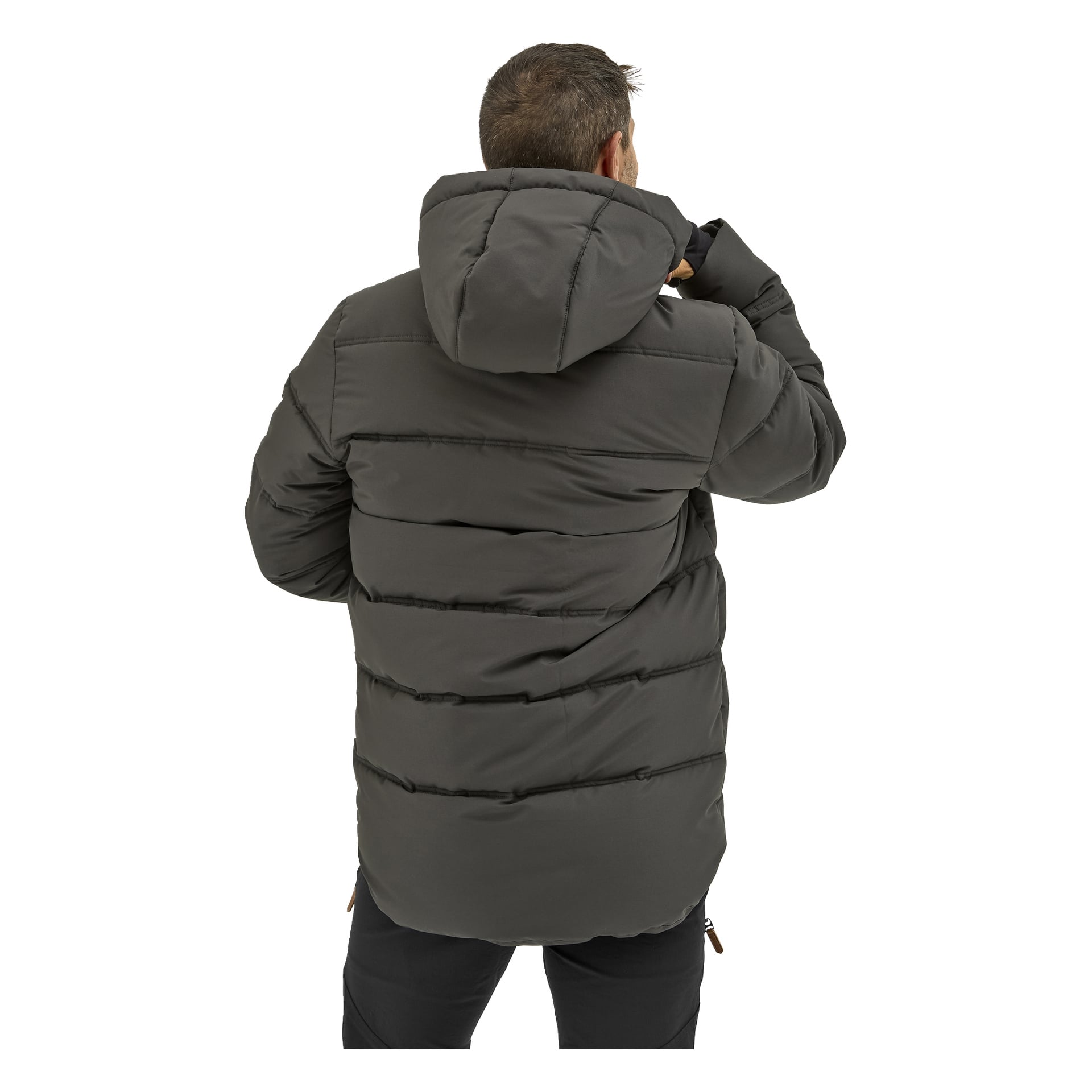 Takaa näkyvä henkilö käyttää tummanharmaata Kayoba Outdoor -miesten talvitakkia Svegiä, jossa on huppu ja vaakasuorat ompelut, ja hän pitää vasenta kättään kasvojen lähellä.